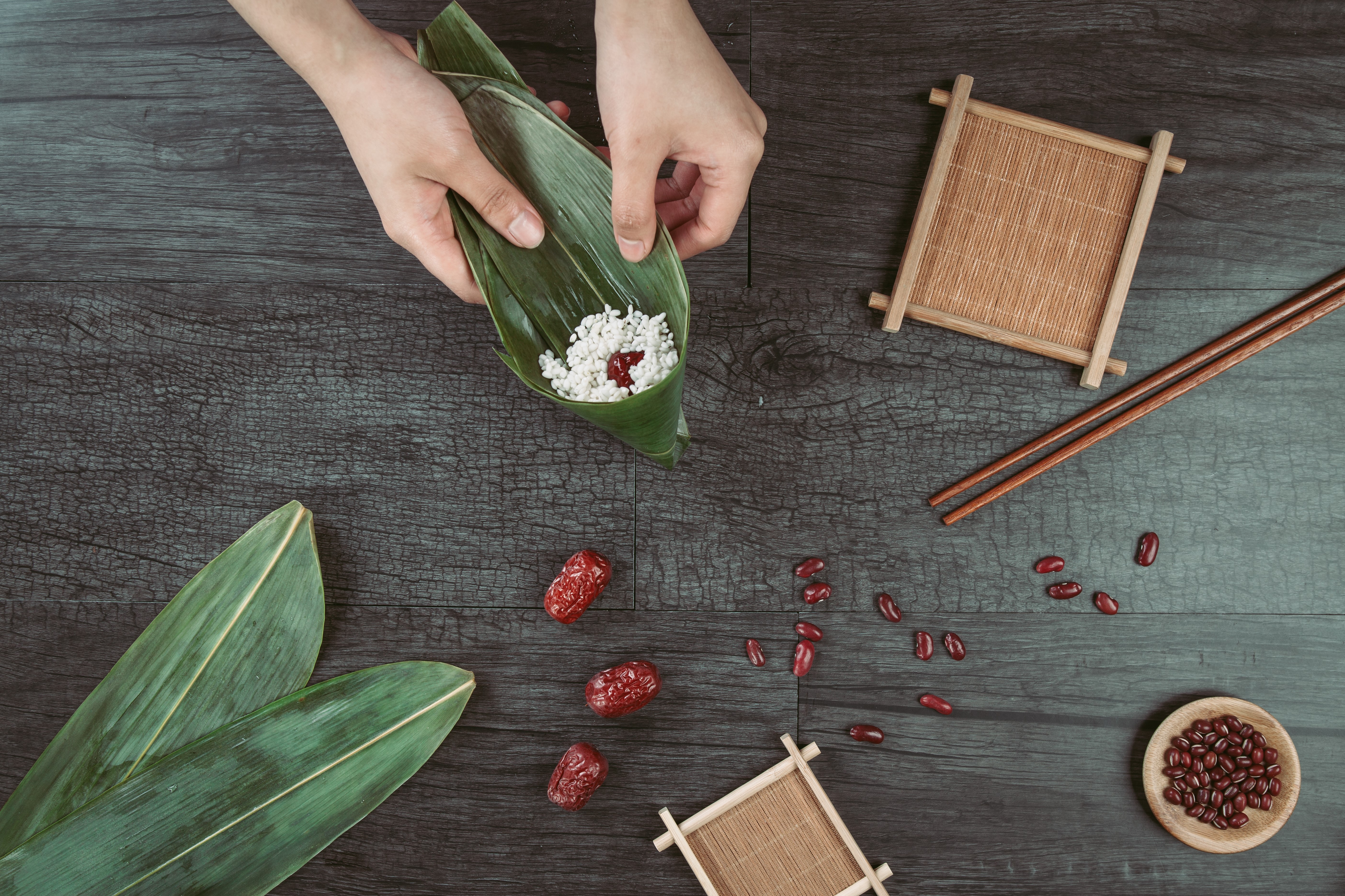 food, rice, leaves, fruit, chopsticks, wooden surface, hands, HD Wallpaper