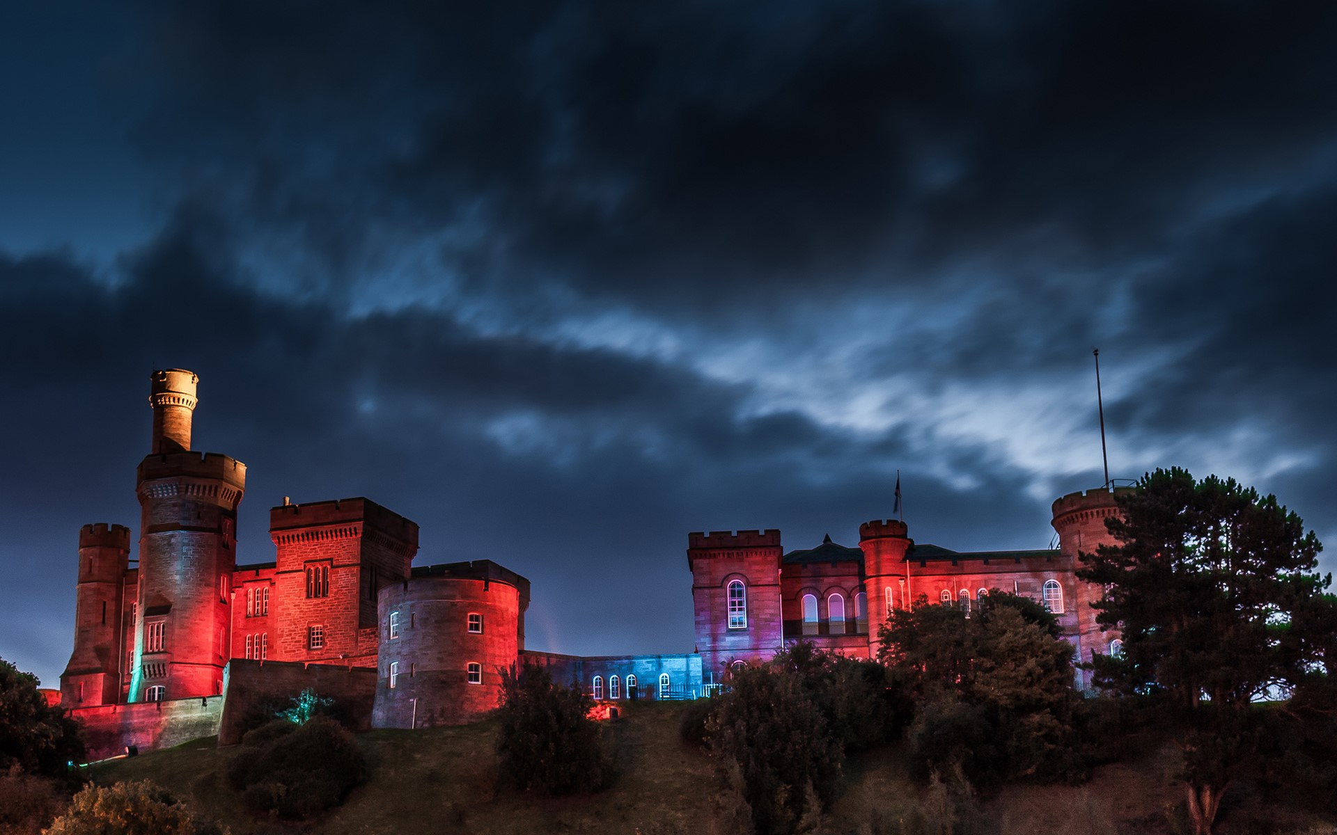 castle, night, clouds, red, lights, tower, sky, HD Wallpaper