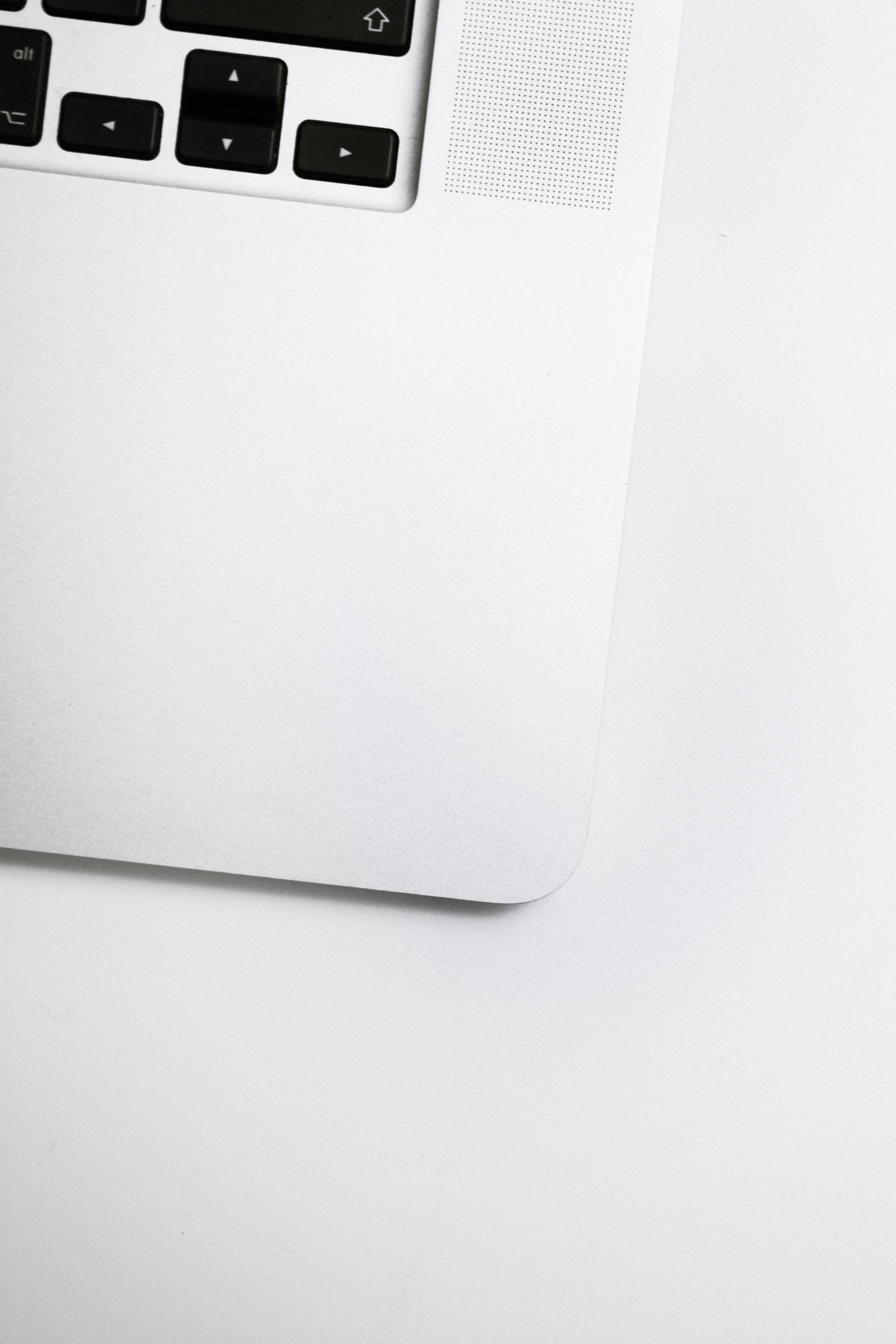 an overhead shot of of a the edge of a laptop keyboard, laptop keyboard edge 4k, Phone HD Wallpaper