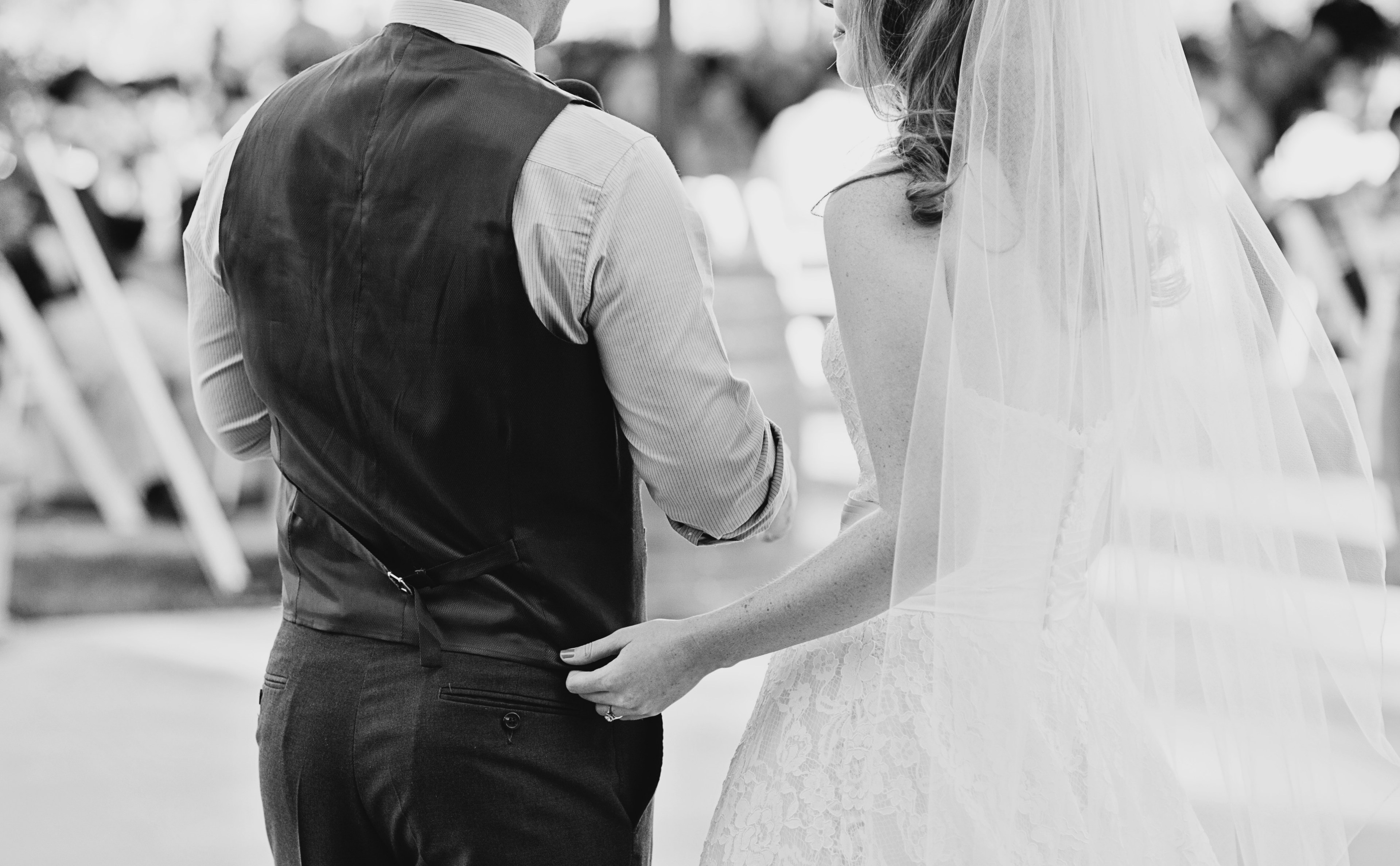 black and white shot from behind of bride touching groom, bride smiles at groom 4k, HD Wallpaper