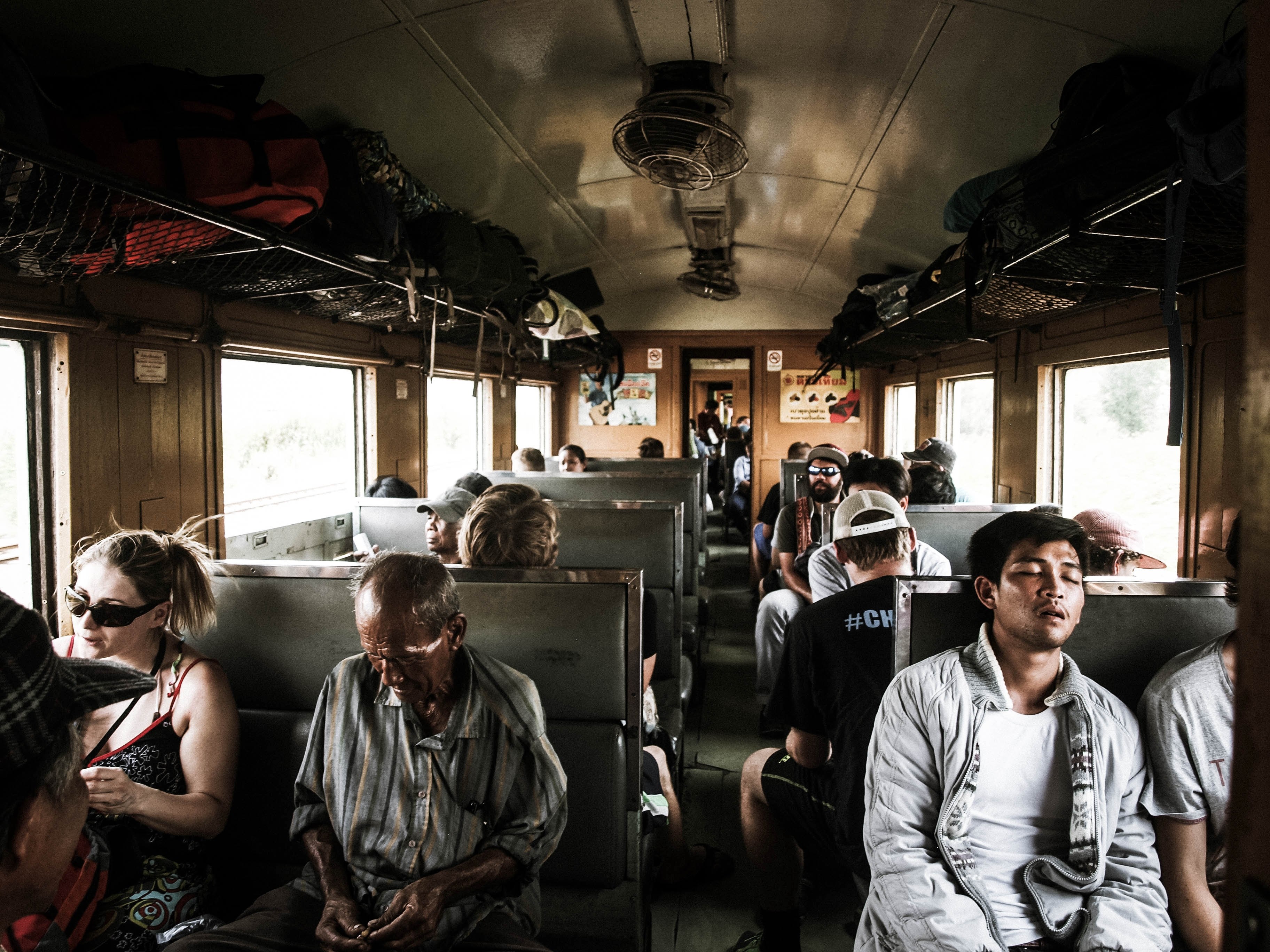 diverse crowd of commuters sit and sleep on a busy train, lost on a train 4k, HD Wallpaper