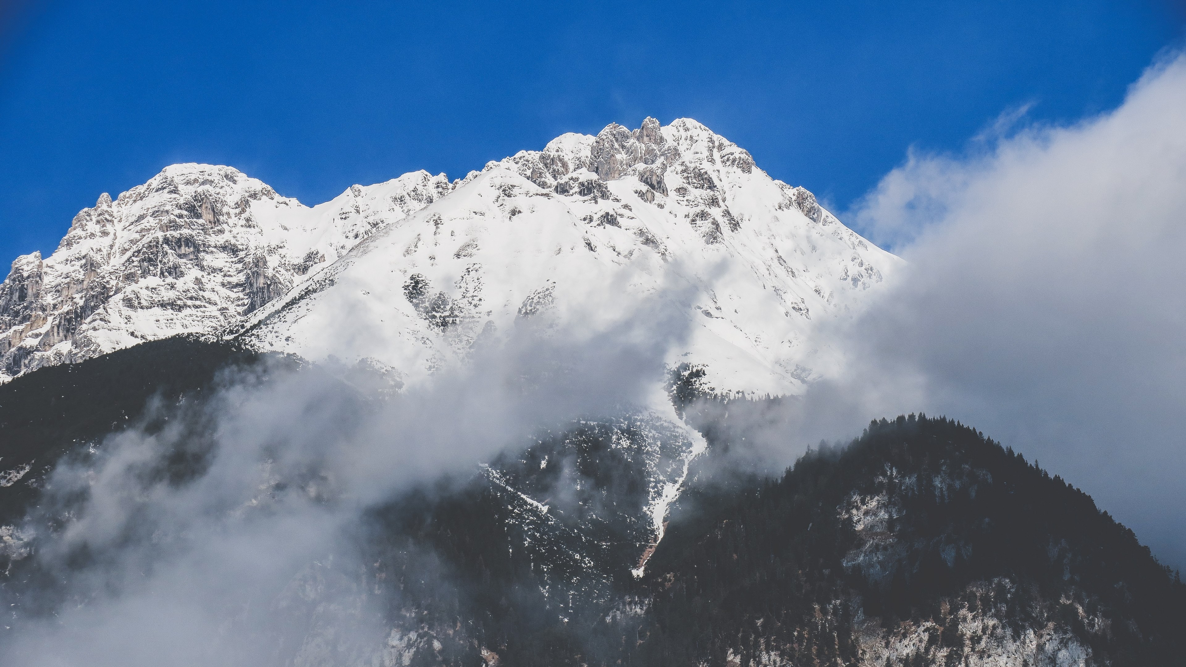 a sharp cloud shrouded peak against a blue sky in innsbruck, day 21 unsplashdaily 4k, HD Wallpaper