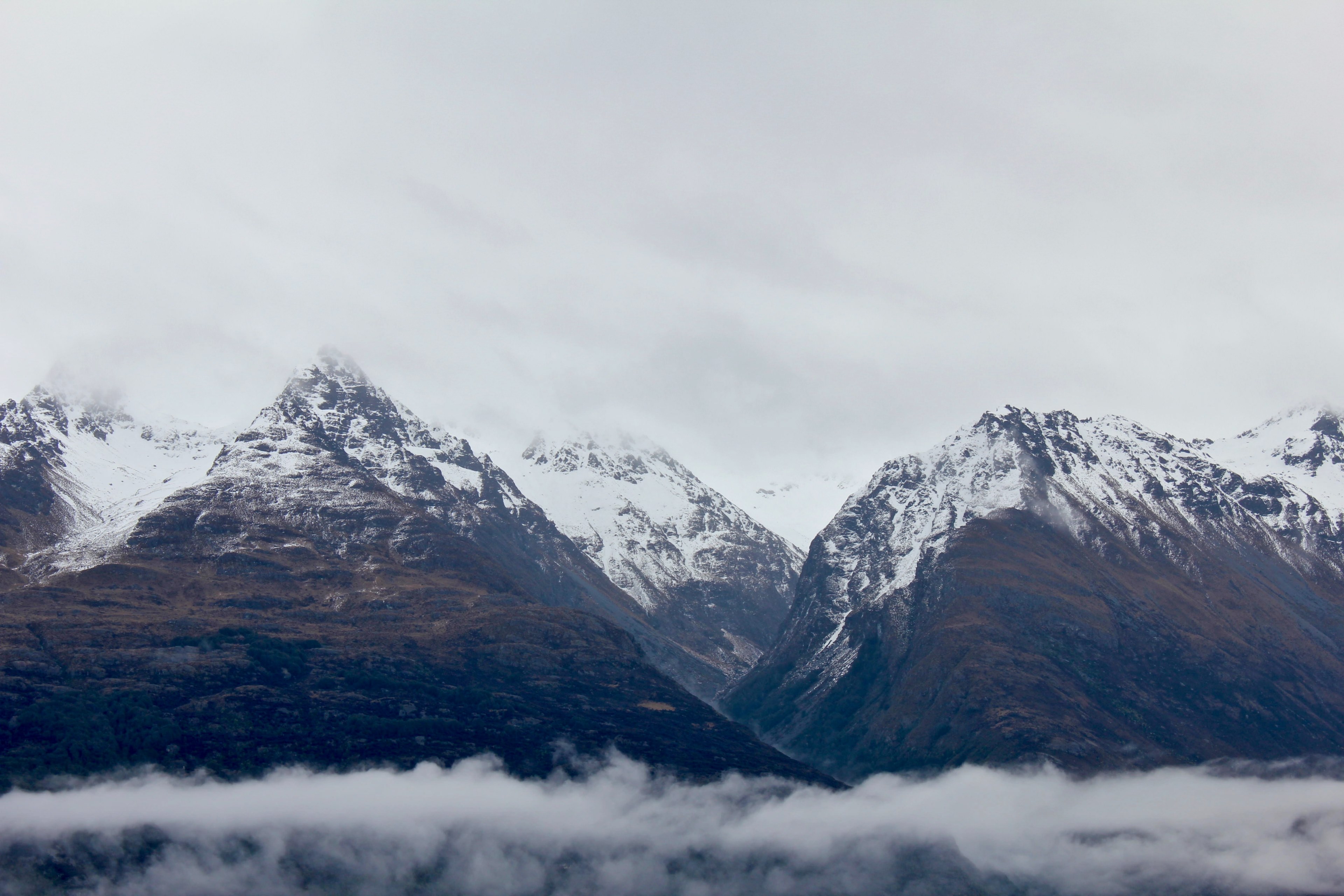 snow covered mountain peaks surrounded by clouds in queenstown, _snow capped mountains 4k, HD Wallpaper
