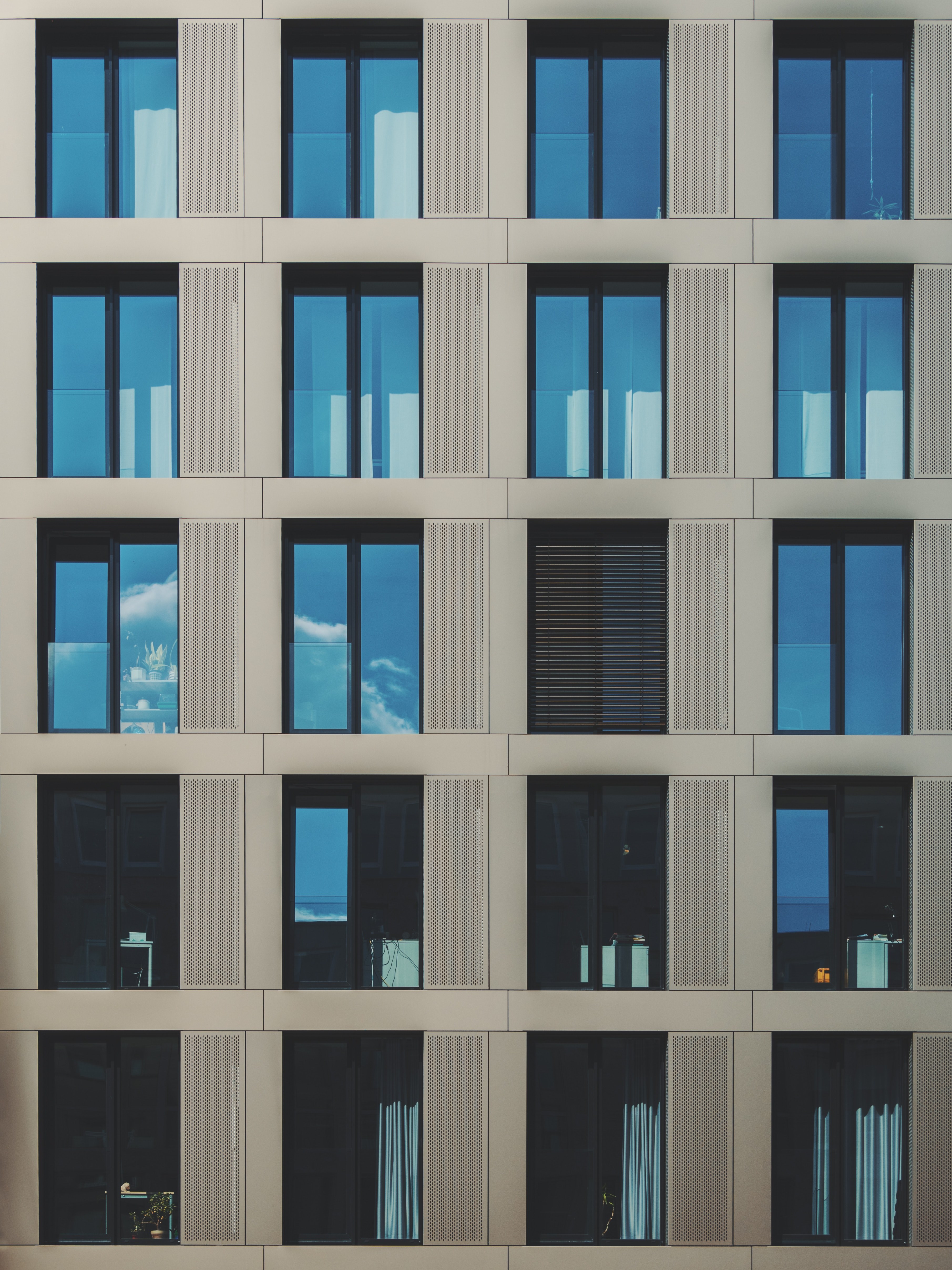 a modern facade of a building in cologne with floor to ceiling windows, modern gray facade in cologne 4k, Phone HD Wallpaper