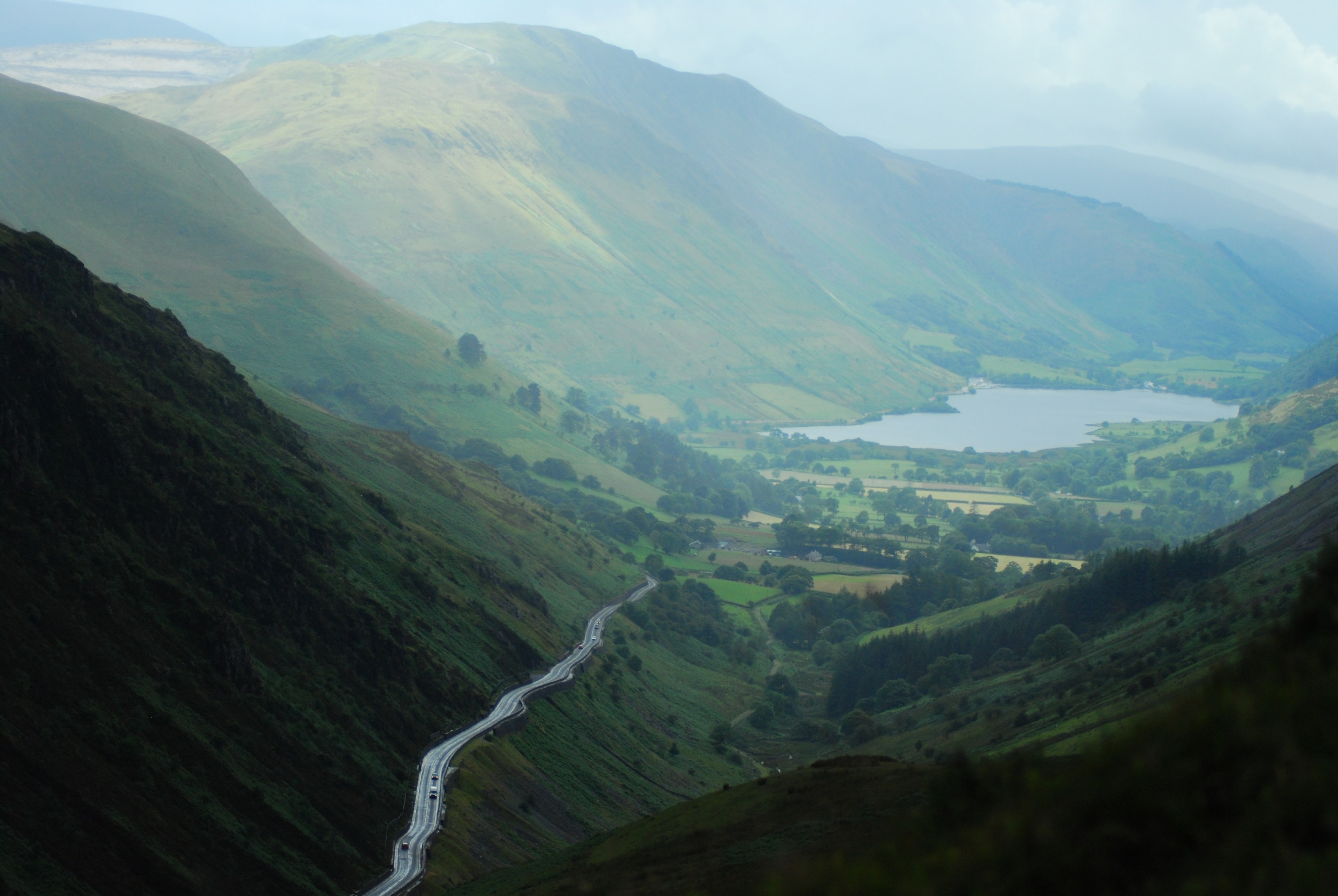 a rural landscape of a steep valley with a road and a village, road to the valley village 4k, HD Wallpaper
