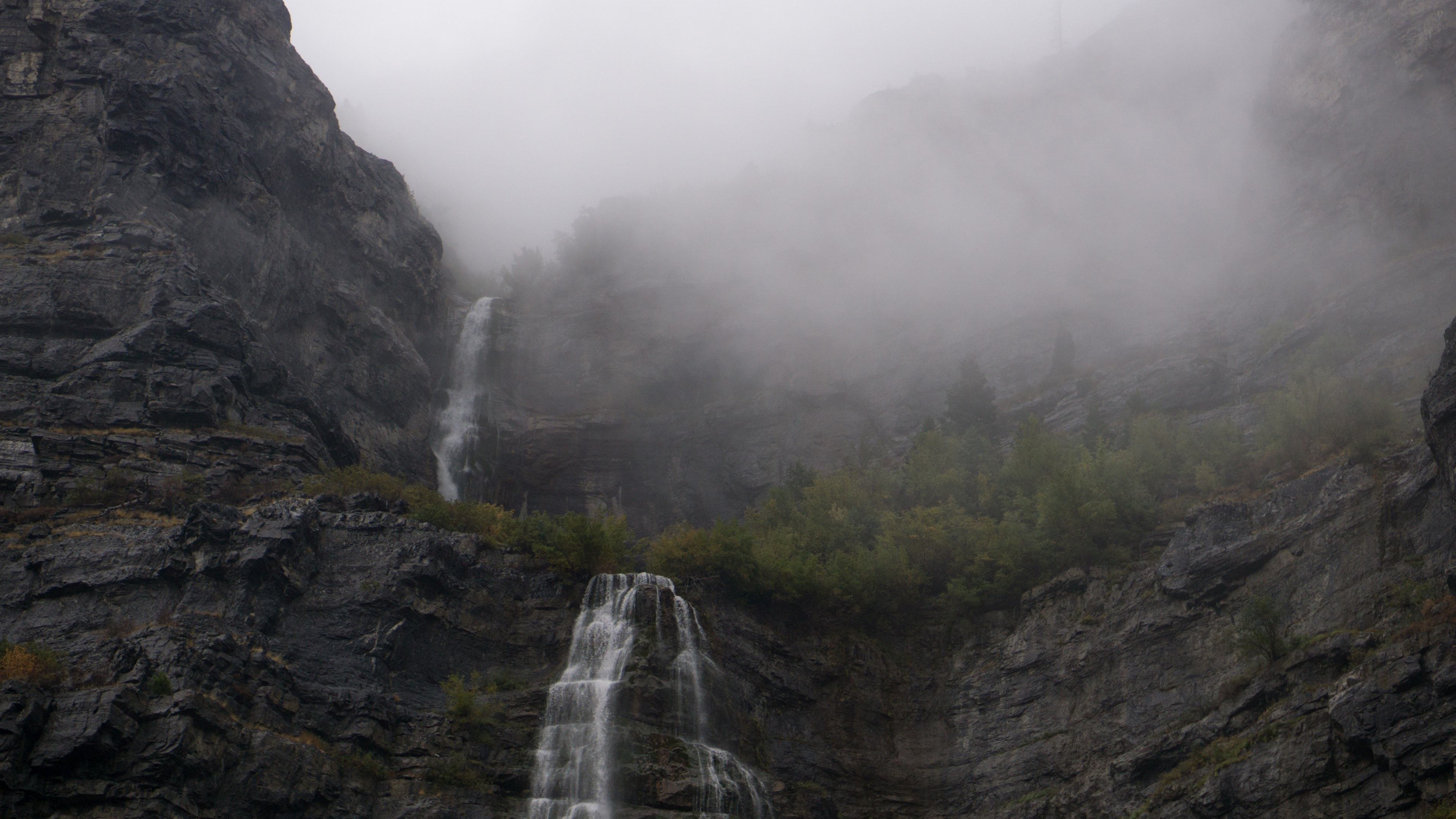 two waterfalls cascading down a rock face on a foggy day, two waterfalls in mist 4k, HD Wallpaper