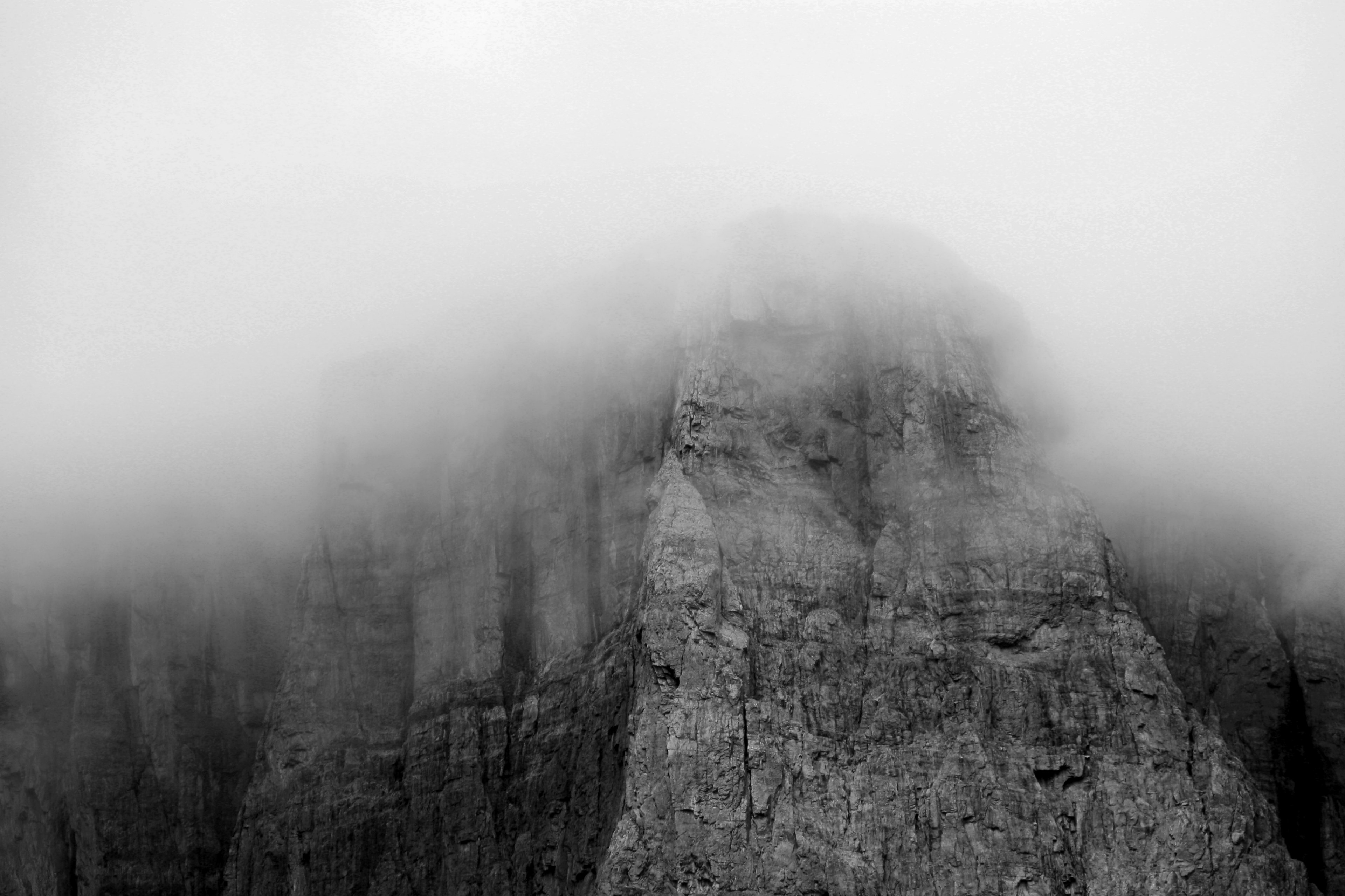 gray rocky facade of castle mountain disappears into the fog, castle mountain in the fog 4k, HD Wallpaper
