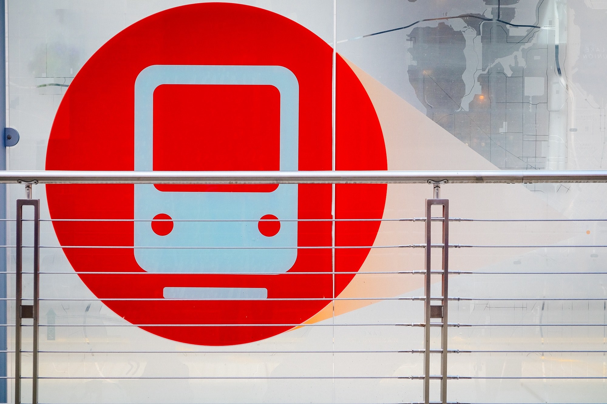 a circular red and white train signage on the wall, _red subway sign 4k, HD Wallpaper