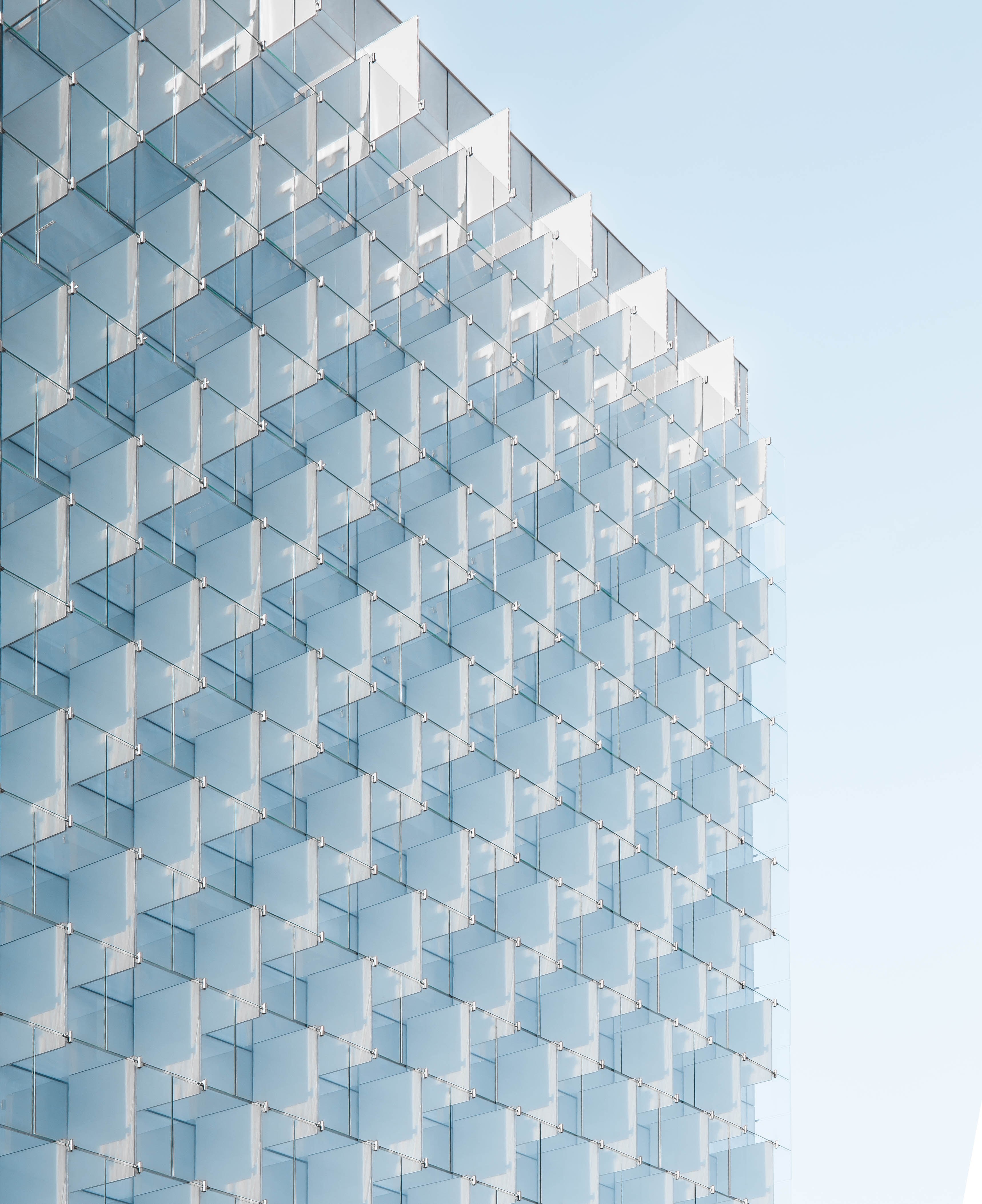 regular glass plates in the facade of an office building in madrid, regular glass facade 4k, Phone HD Wallpaper