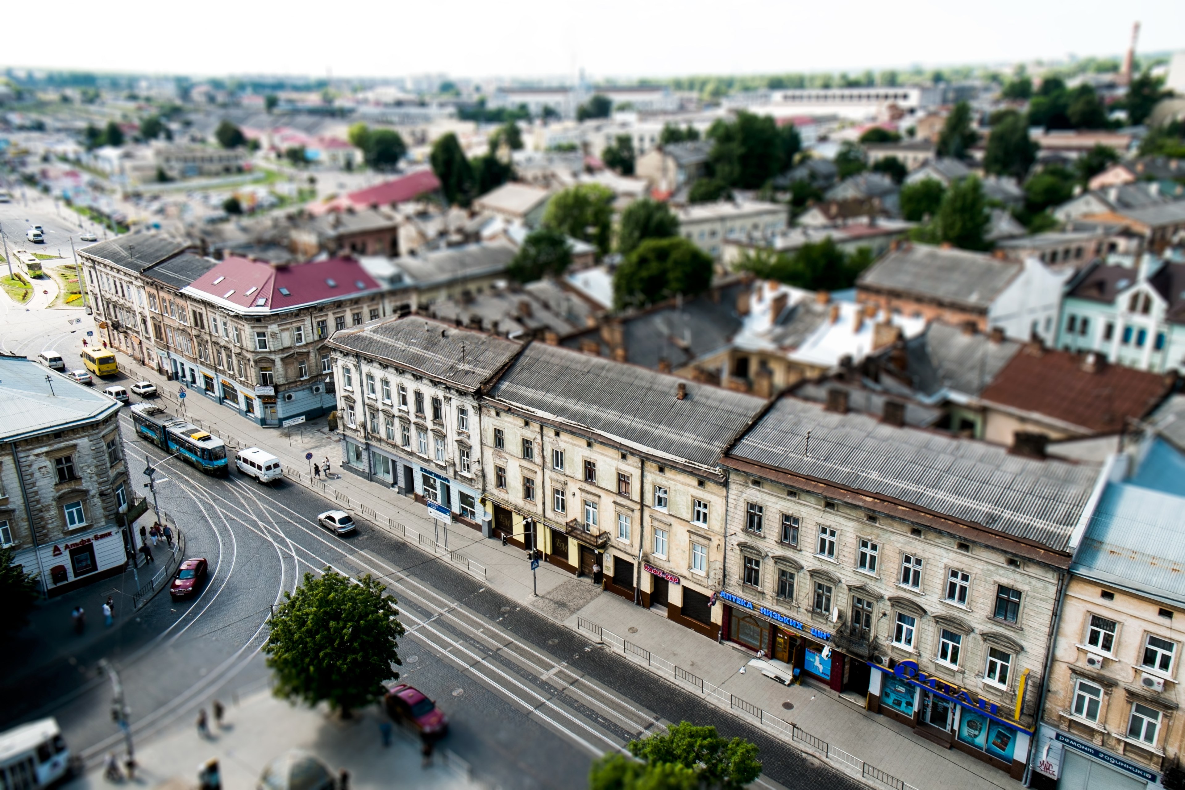 aerial view of a suburban setting with houses and buildings in a neighborhood with cars and people on the street, suburban neighborhood 4k, HD Wallpaper