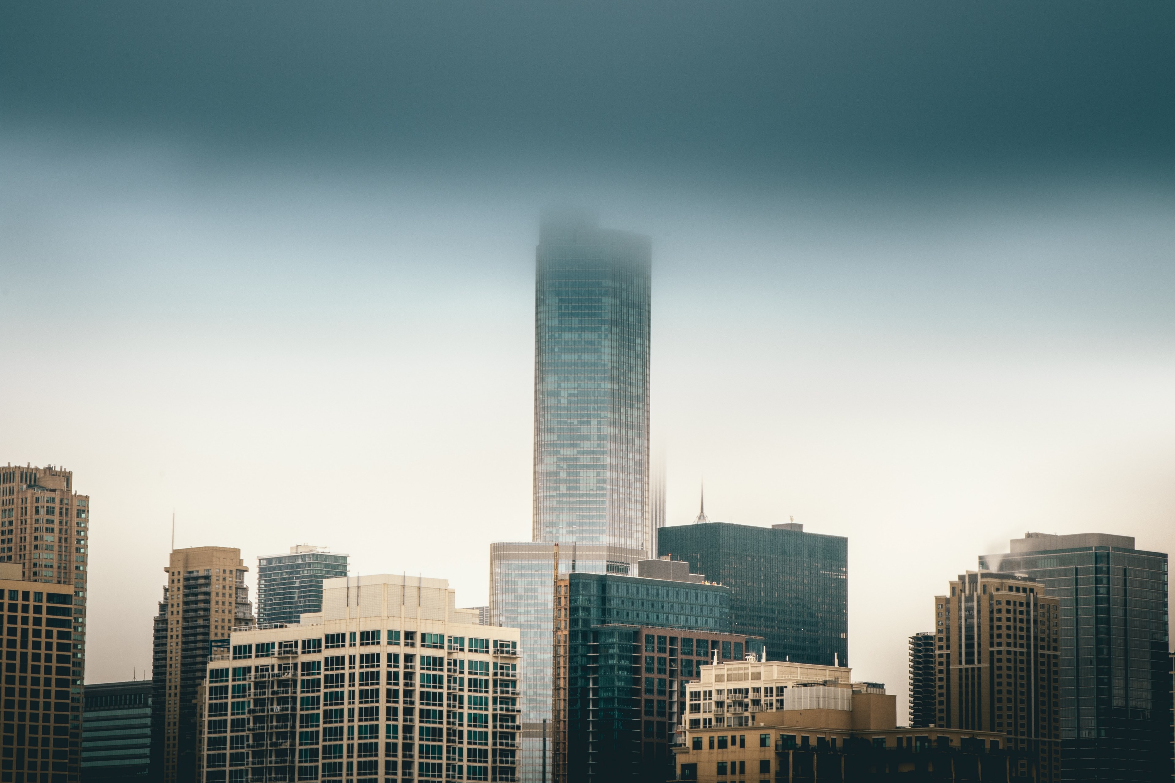 skyscrapers and high rises in a city on a foggy day, skyscrapers in fog 4k, HD Wallpaper