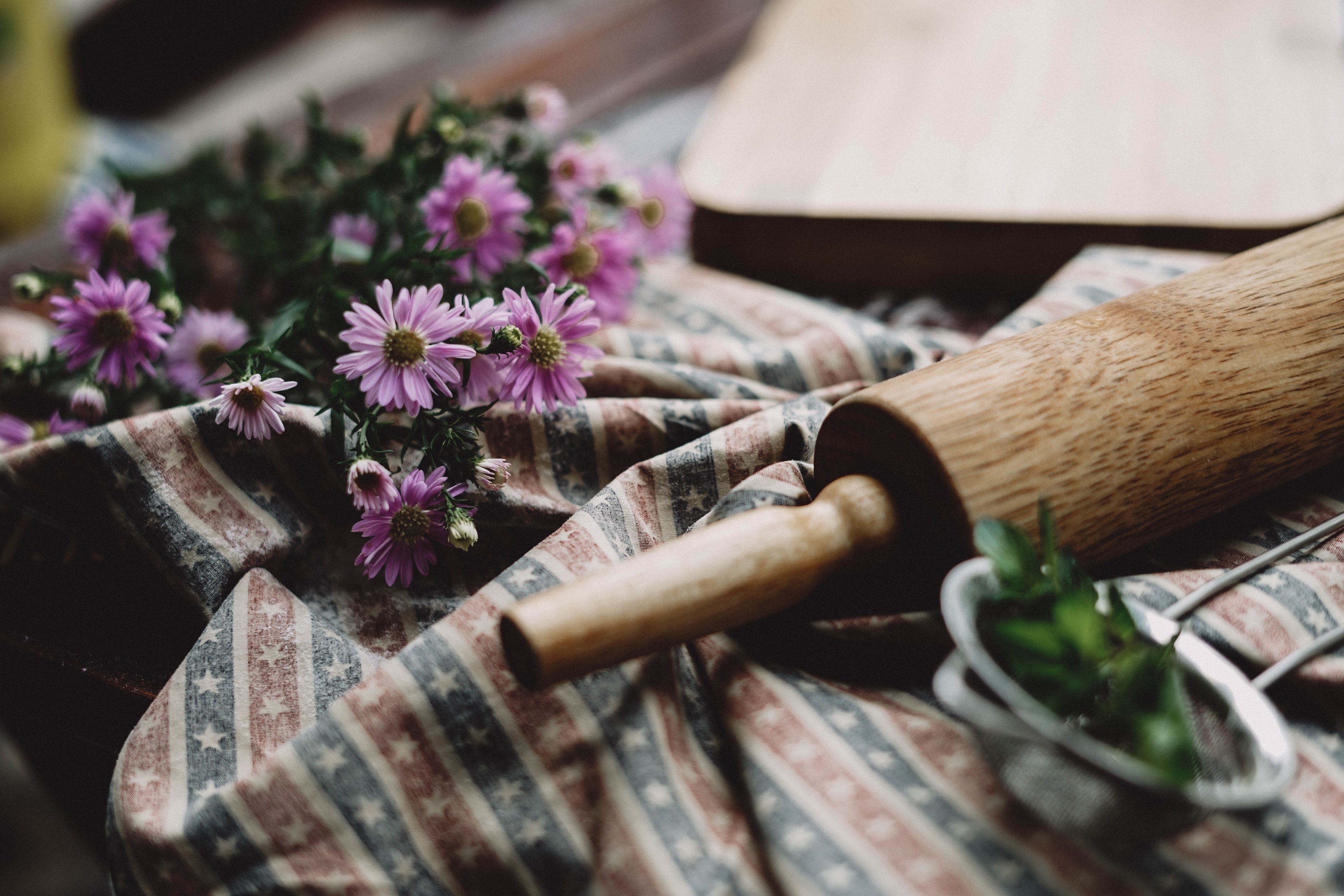 a bunch of pink daisies next to a rolling pin, flowers for grandma 4k, HD Wallpaper