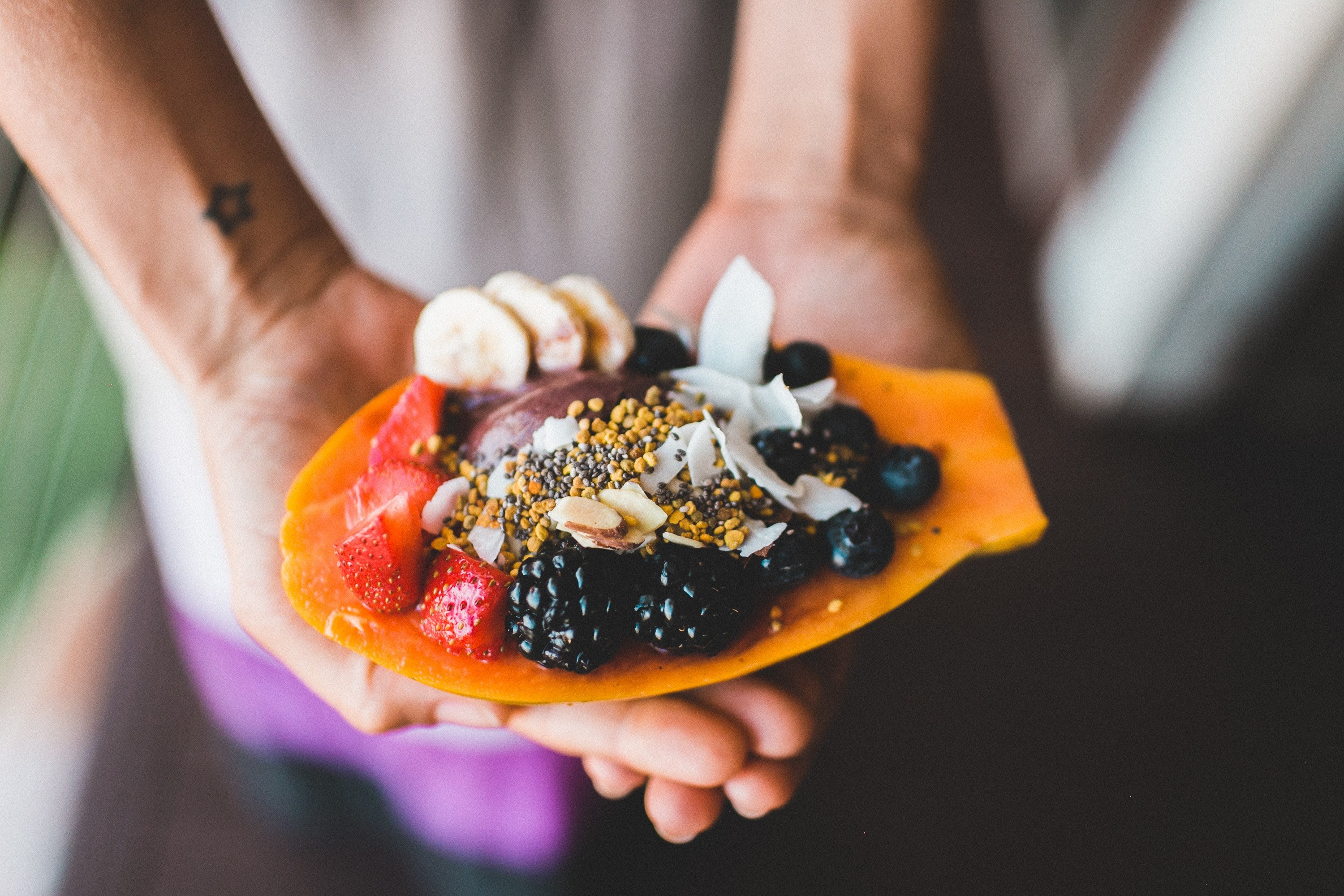 person with star tattoo holding out a healthy snack with various berries and juicy fruits, healthy tropical breakfast 4k, HD Wallpaper