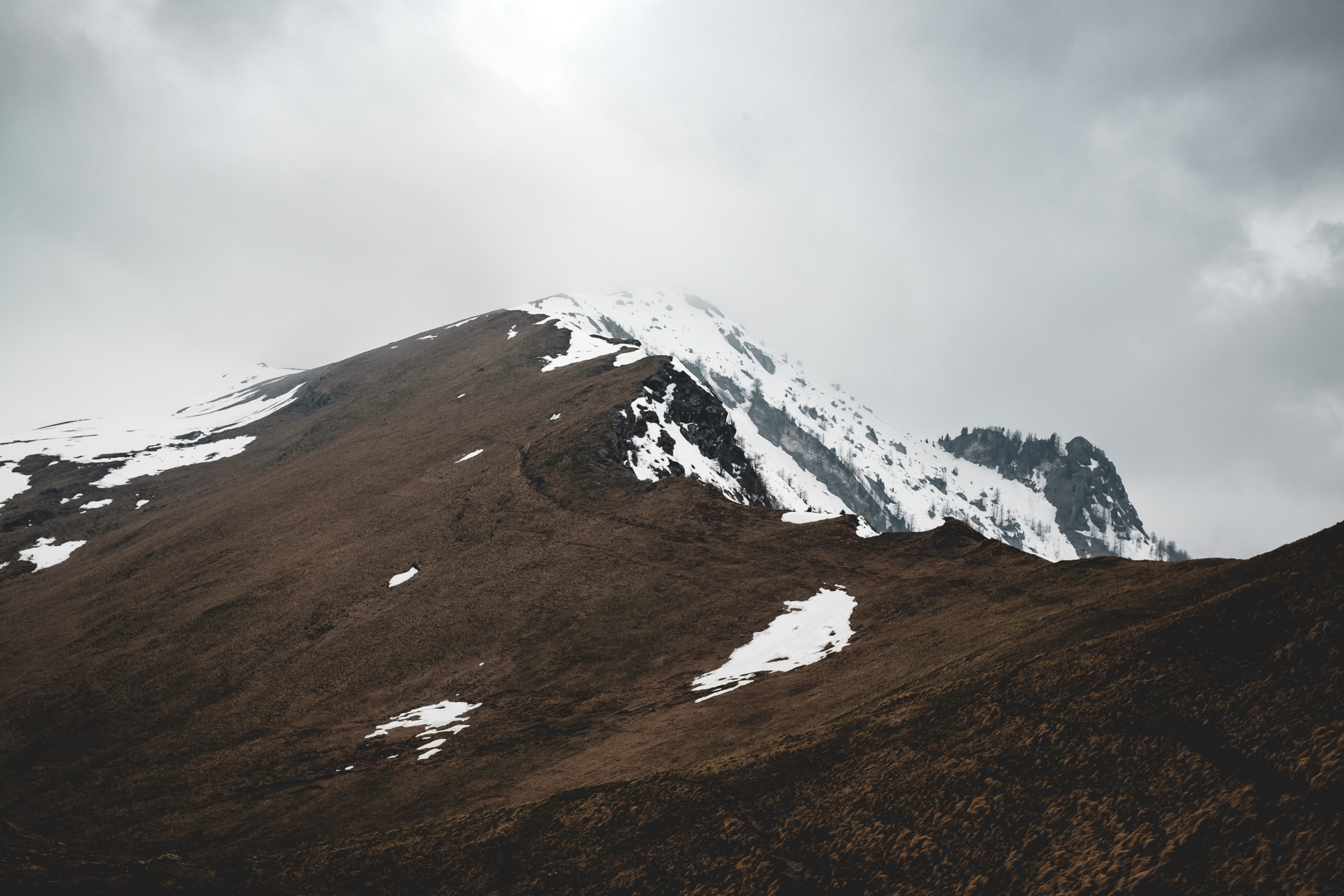 a snowy mountain mixes with a cloudy overcast sky, after a long time 4k, HD Wallpaper