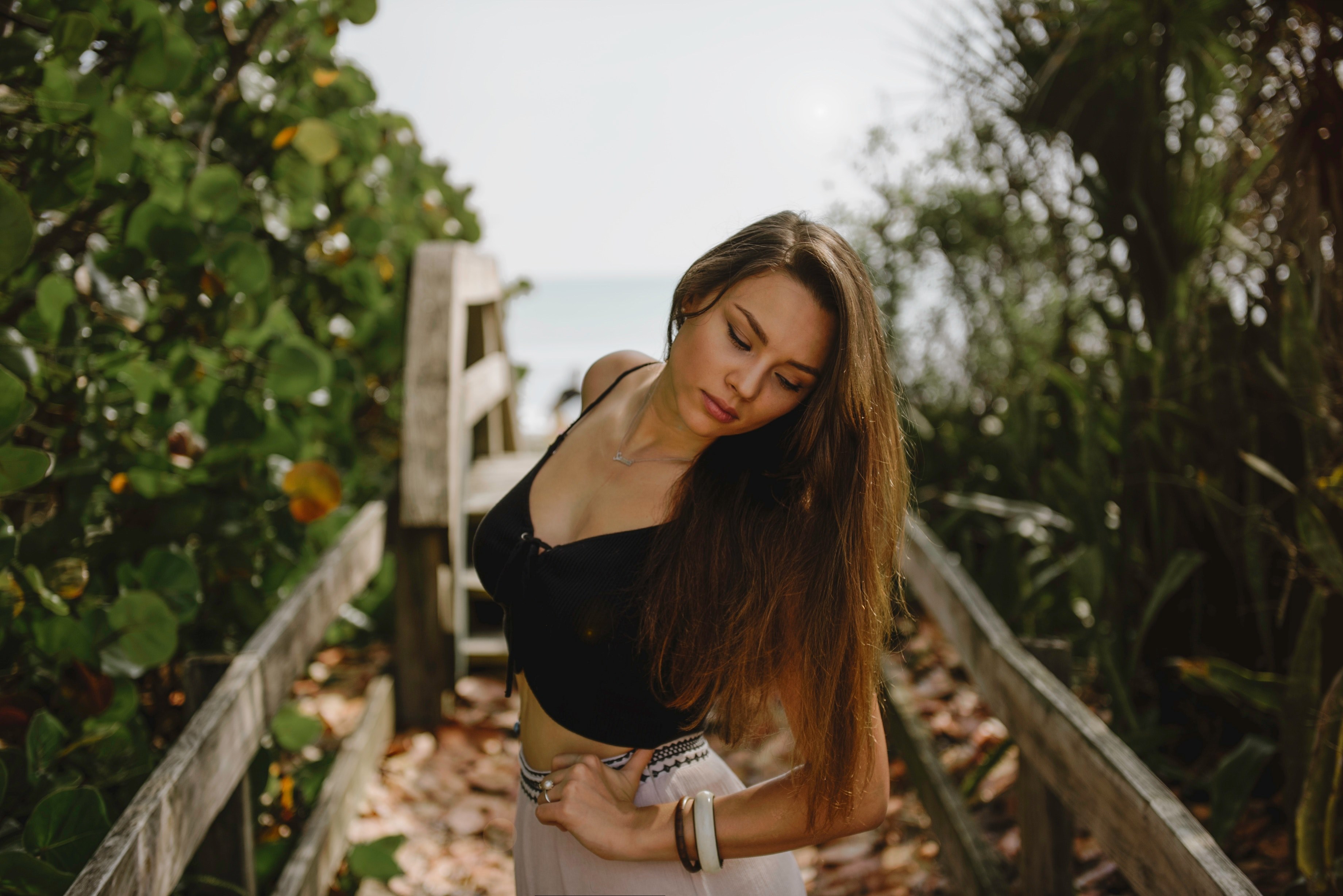 long hair woman in black top posing on wooden path at melbourne beach, woman in black top posing 4k, HD Wallpaper