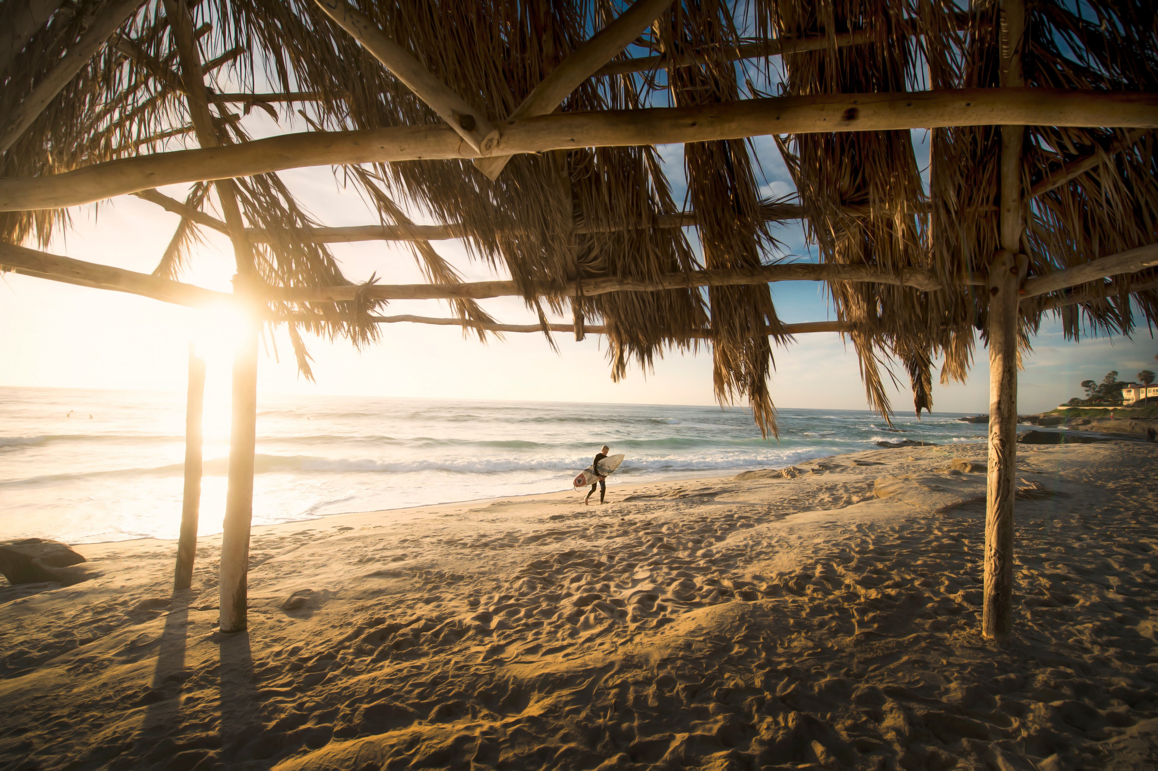 view of a surfer at the sand beach from the surfer shack in la jolla at sunset, surfer and beach hut 4k, HD Wallpaper