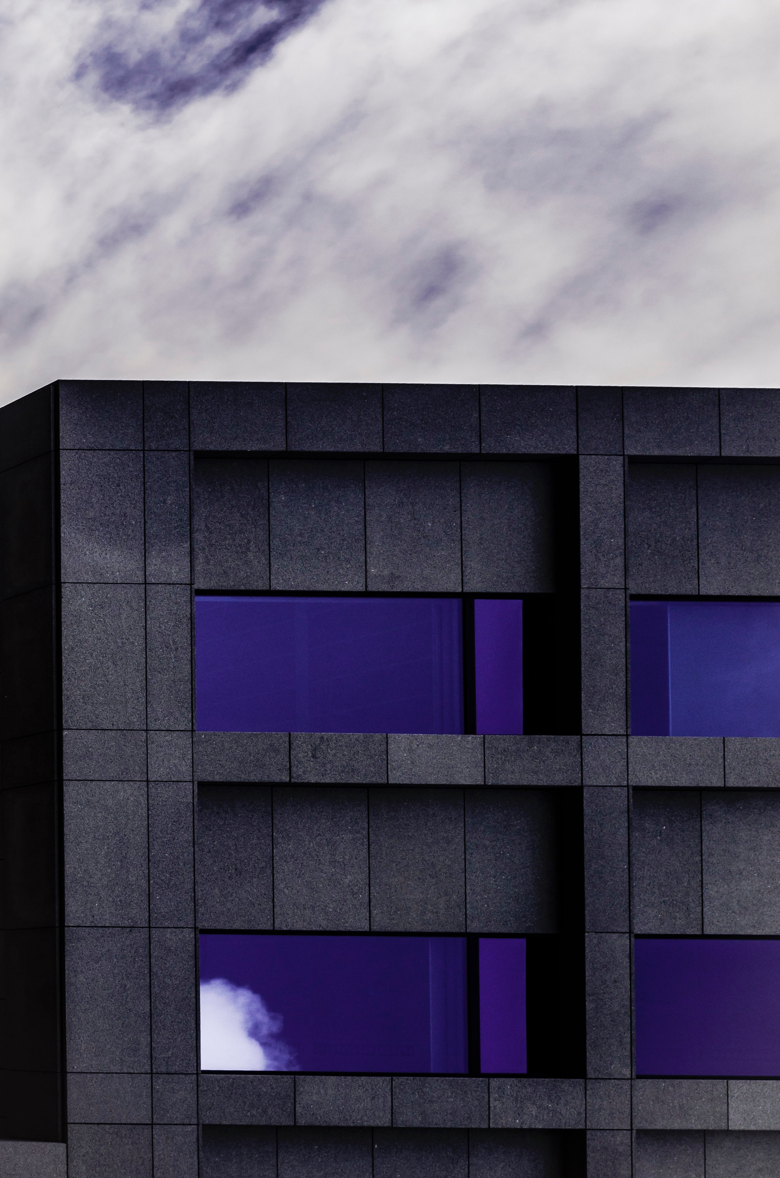 a black facade with dark blue sky reflected in the buildings windows, black and blue facade 4k, Phone HD Wallpaper