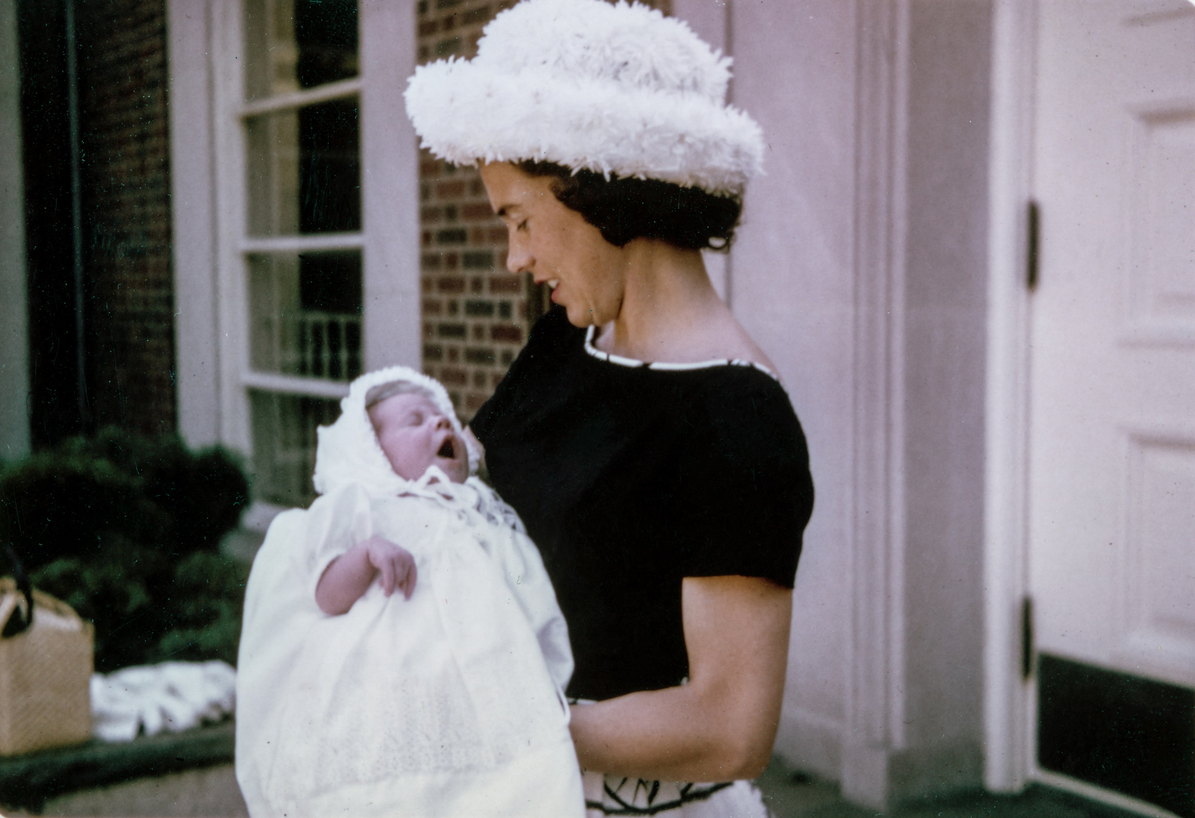 a vintage photo of a woman wearing a bonnet holding a newborn baby wearing a white gown, vintage baby gown 4k, HD Wallpaper