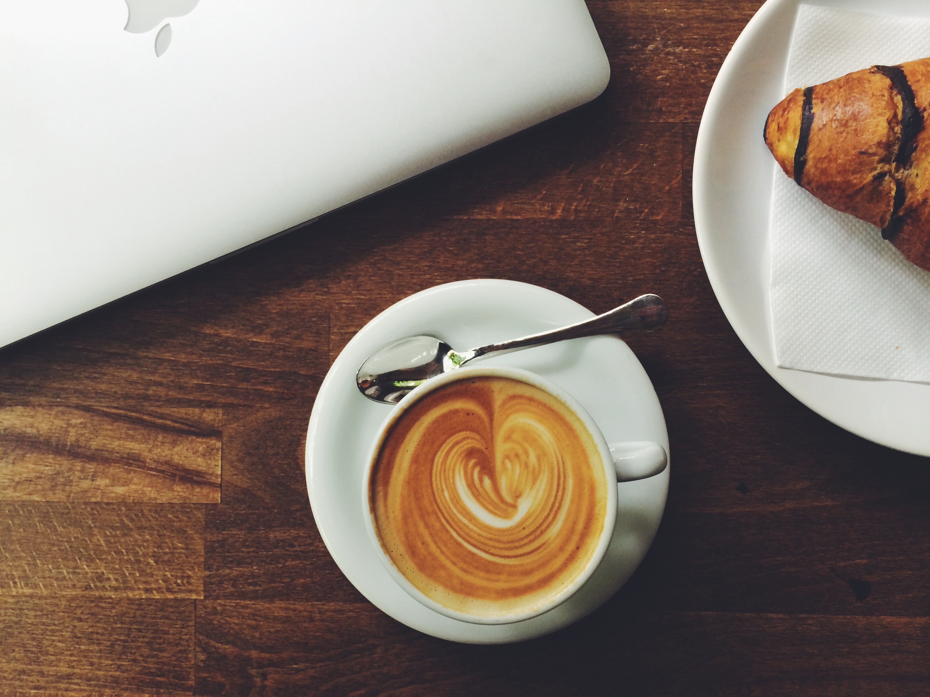 an overhead shot of a latte near a croissant and a macbook, latte and croissant 4k, HD Wallpaper