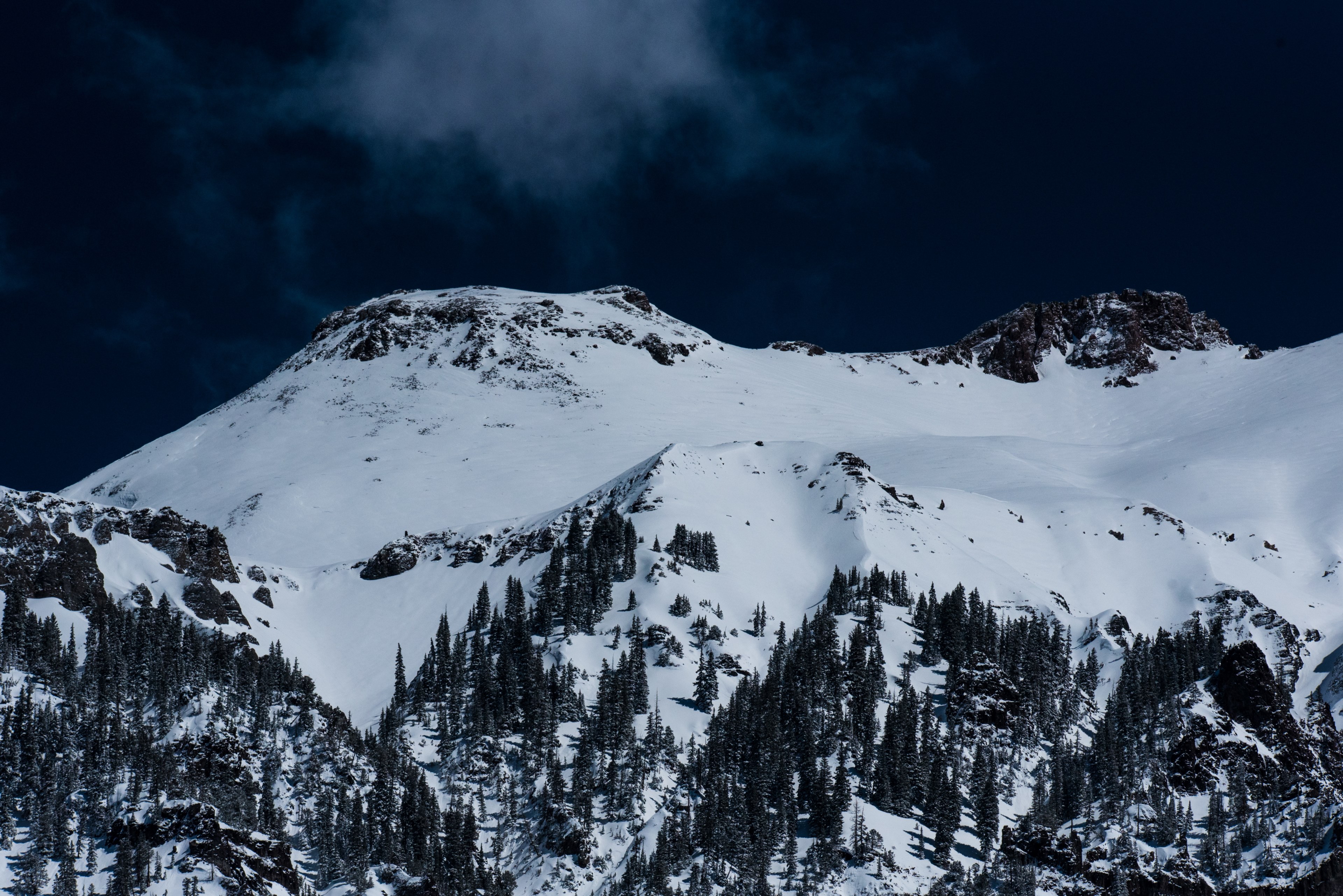 a tall snow covered mountain under a dark evening sky, mountain in ouray in the evening 4k, HD Wallpaper