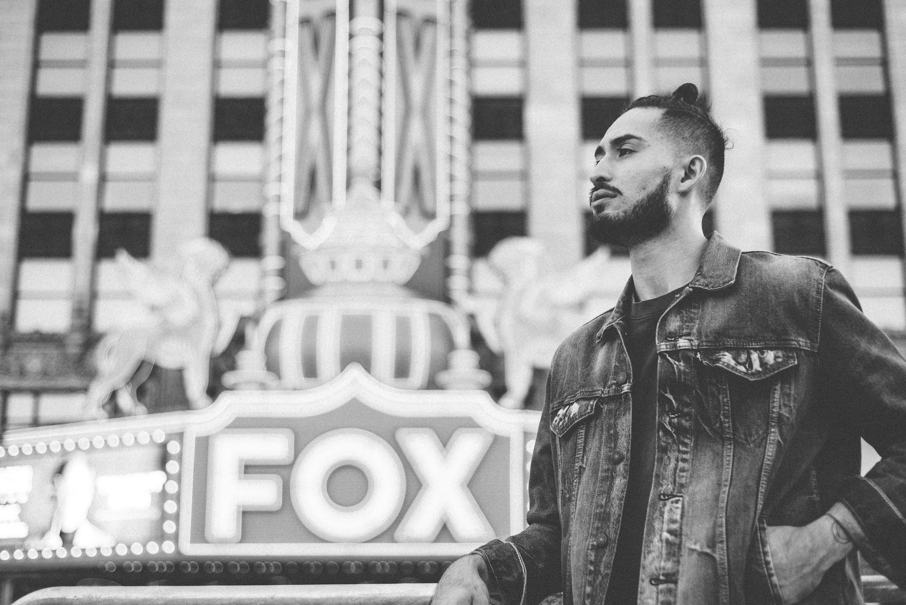 black and white shot of young beared man in denim jacket at fox theatre, man in denim at fox theatre 4k, HD Wallpaper