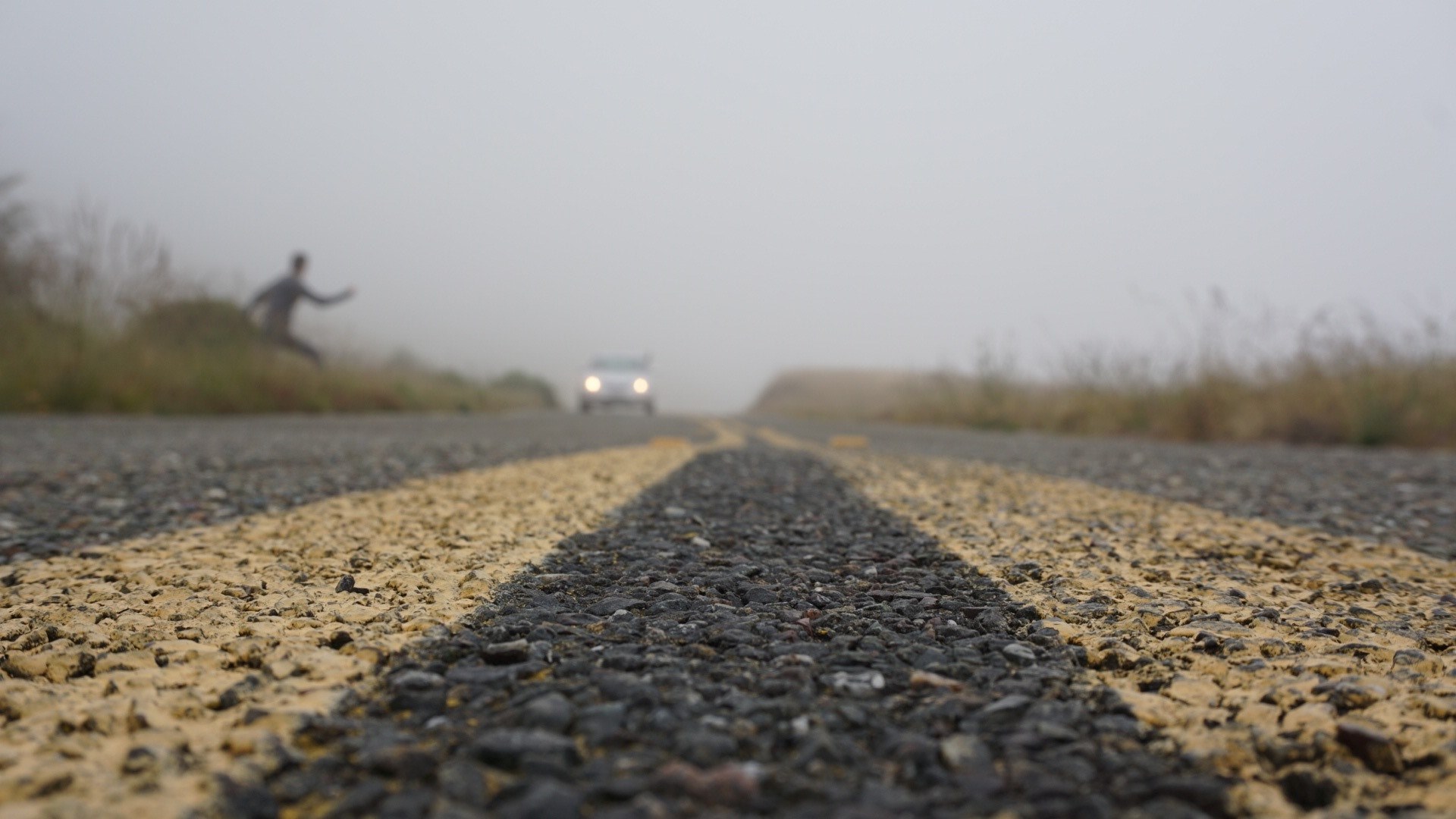road level view of a person crossing the foggy road, _hitchhiking in the country 4k, HD Wallpaper
