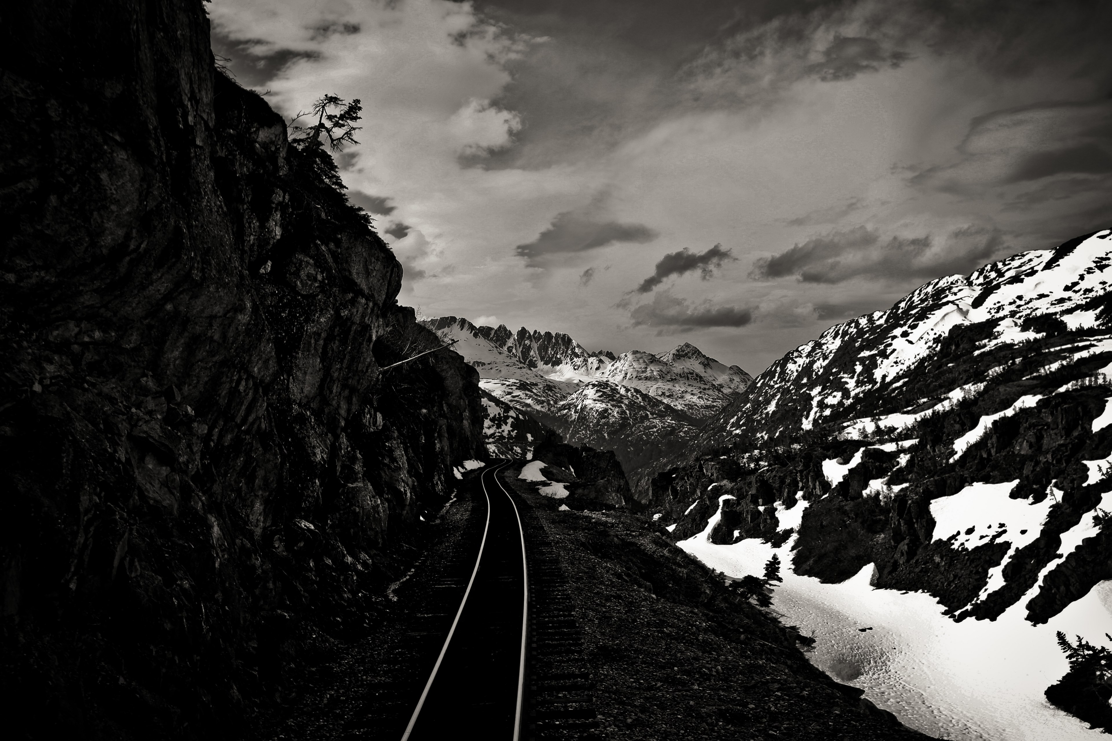 railroad track lines the side of a mountain in the snow, railroad on a mountain 4k, HD Wallpaper