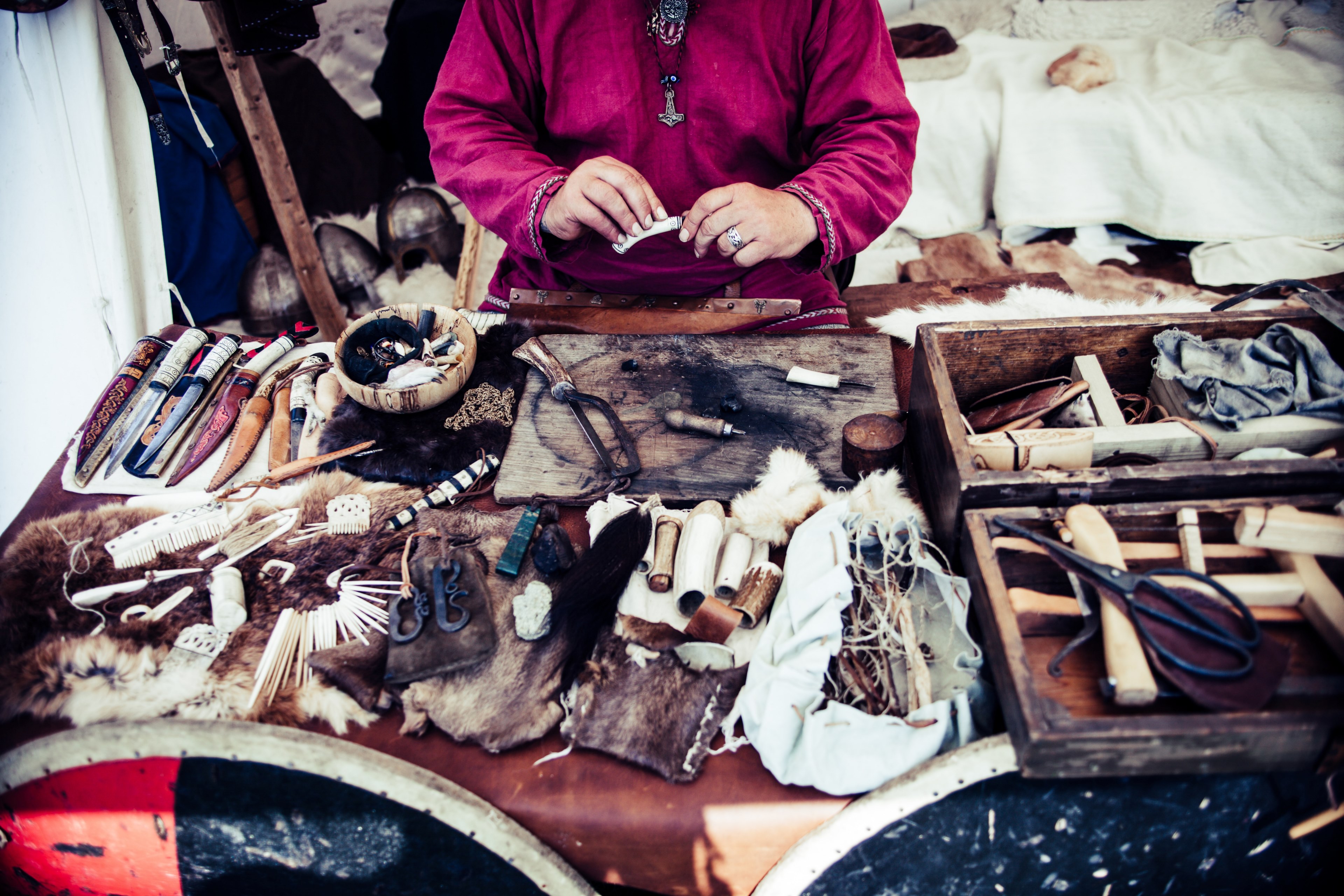 a person crafting various trinkets from leather and wood, leather trinket craftsman 4k, HD Wallpaper