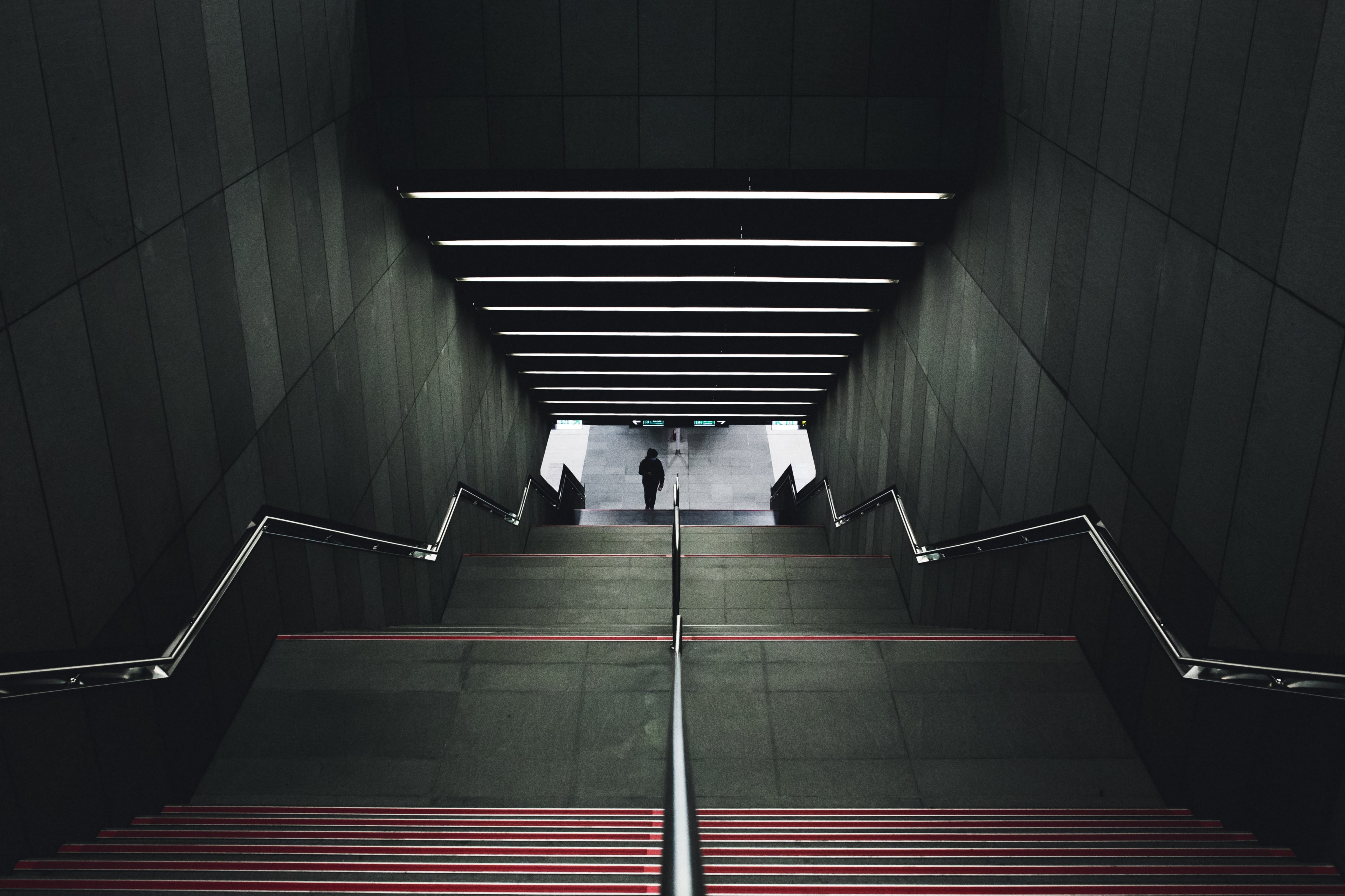 looking down a symmetrical staircase in an urban transportation station, stair symmetry 4k, HD Wallpaper