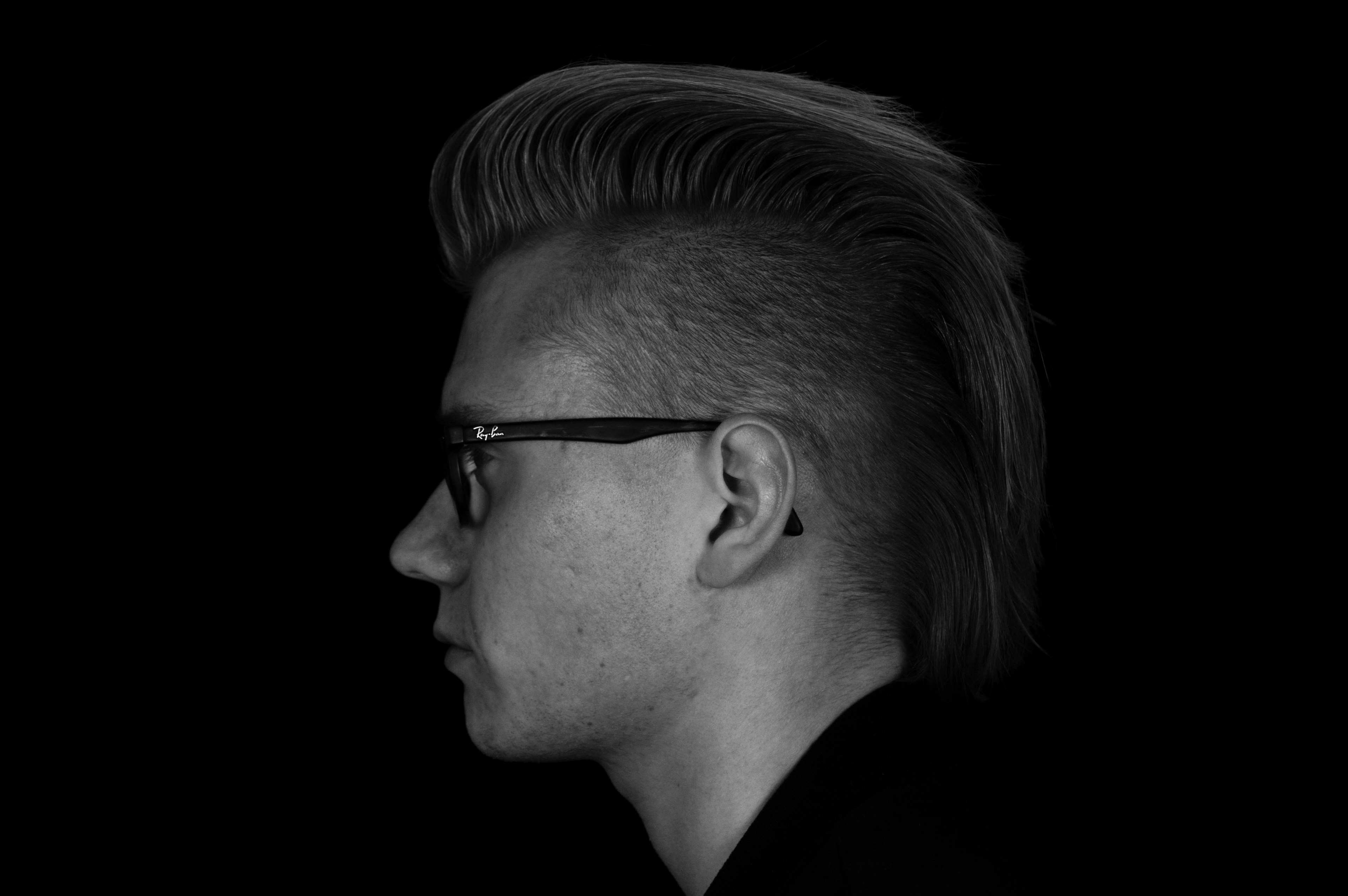 black and white shot of young man with glasses and mohican hair cut, monochrome mohican hair 4k, HD Wallpaper