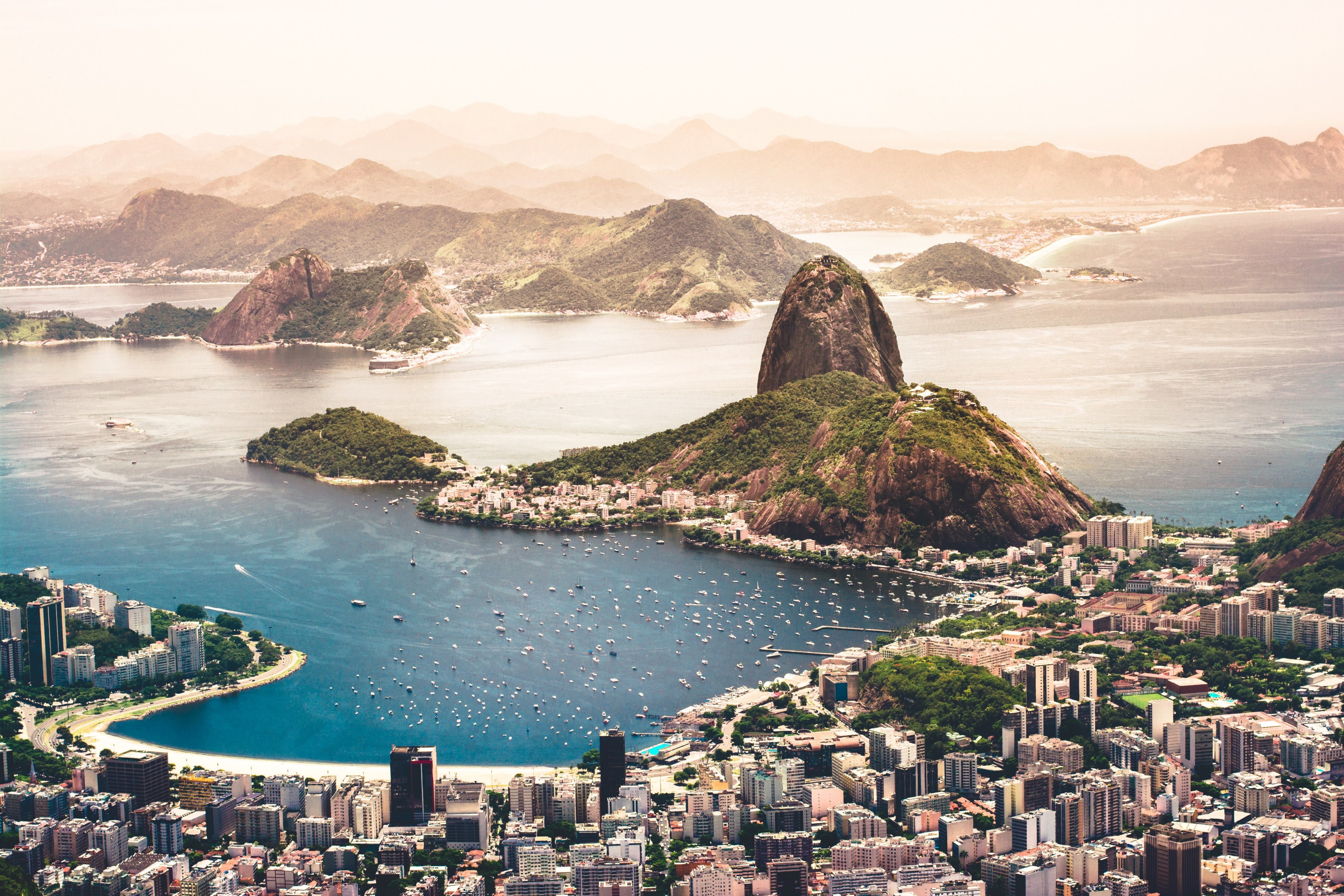 aerial view of brazils rio de janeiro and its beaches buildings and boats on blue waters with hills and mountains nearby, wildest sunset ever 4k, HD Wallpaper