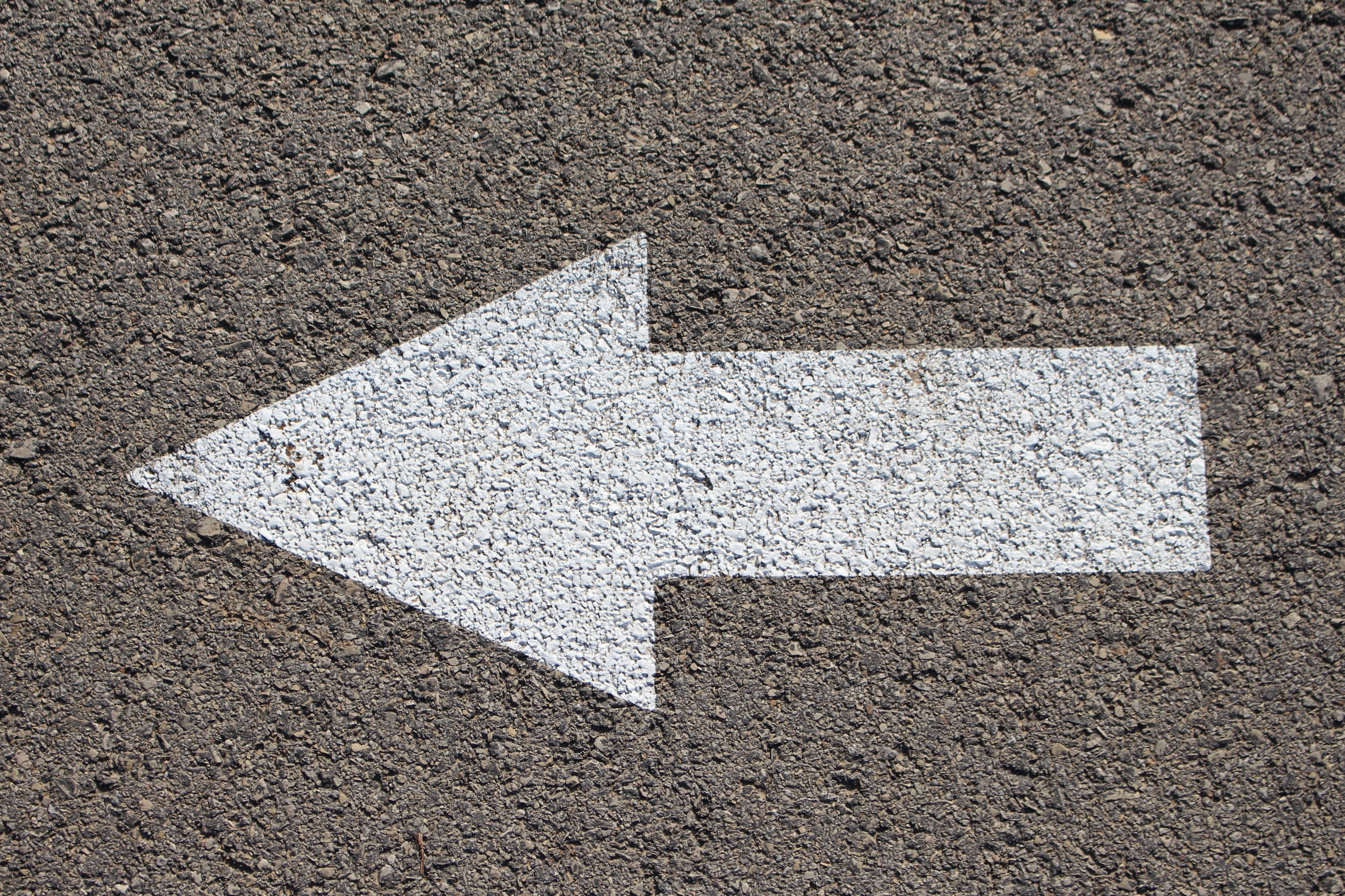 an asphalt road with a white arrow painted on it, arrow in the road 4k, HD Wallpaper