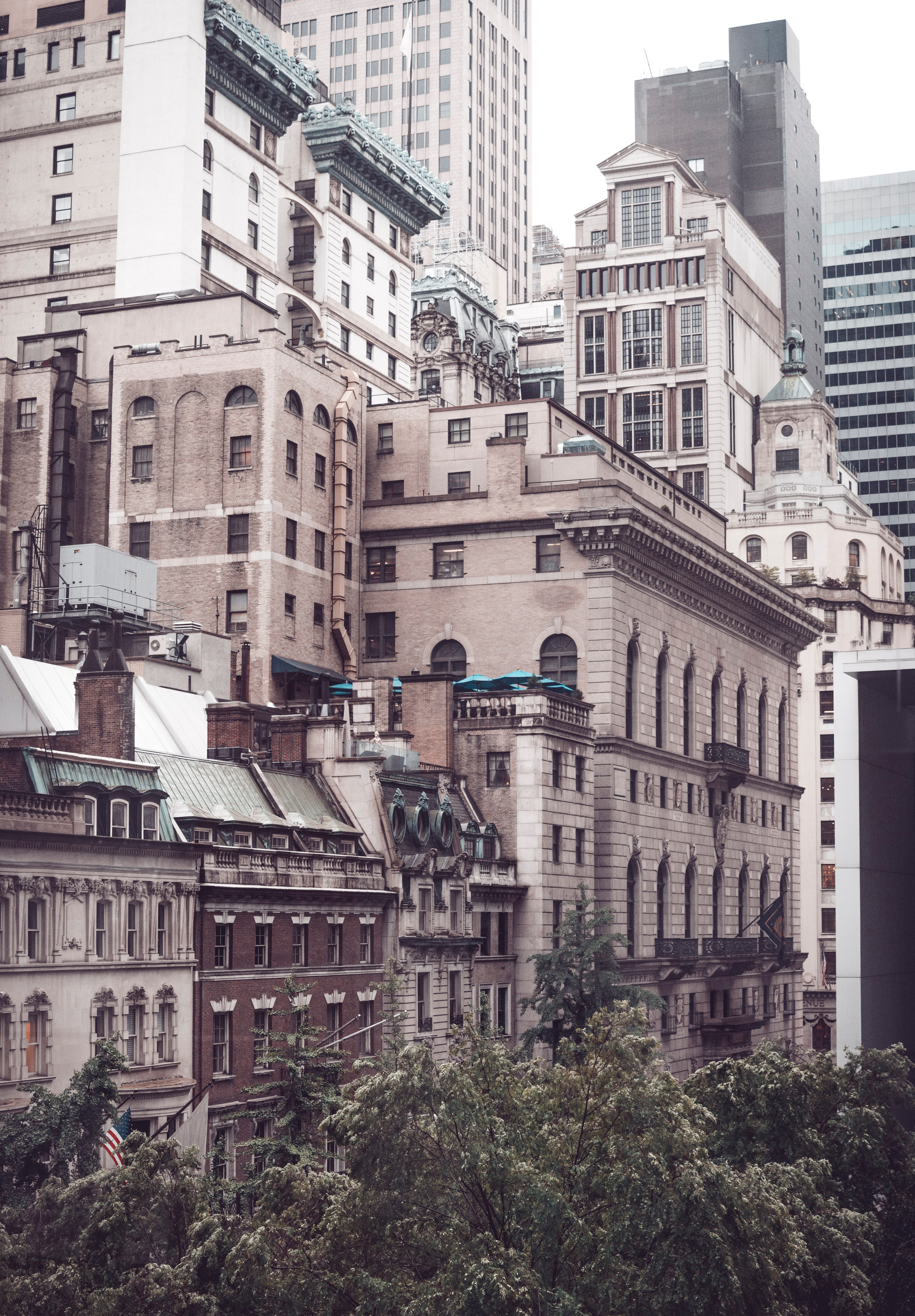 long shot of urban city buildings skyscrapers and trees at the museum of modern art, views from moma 4k, Phone HD Wallpaper