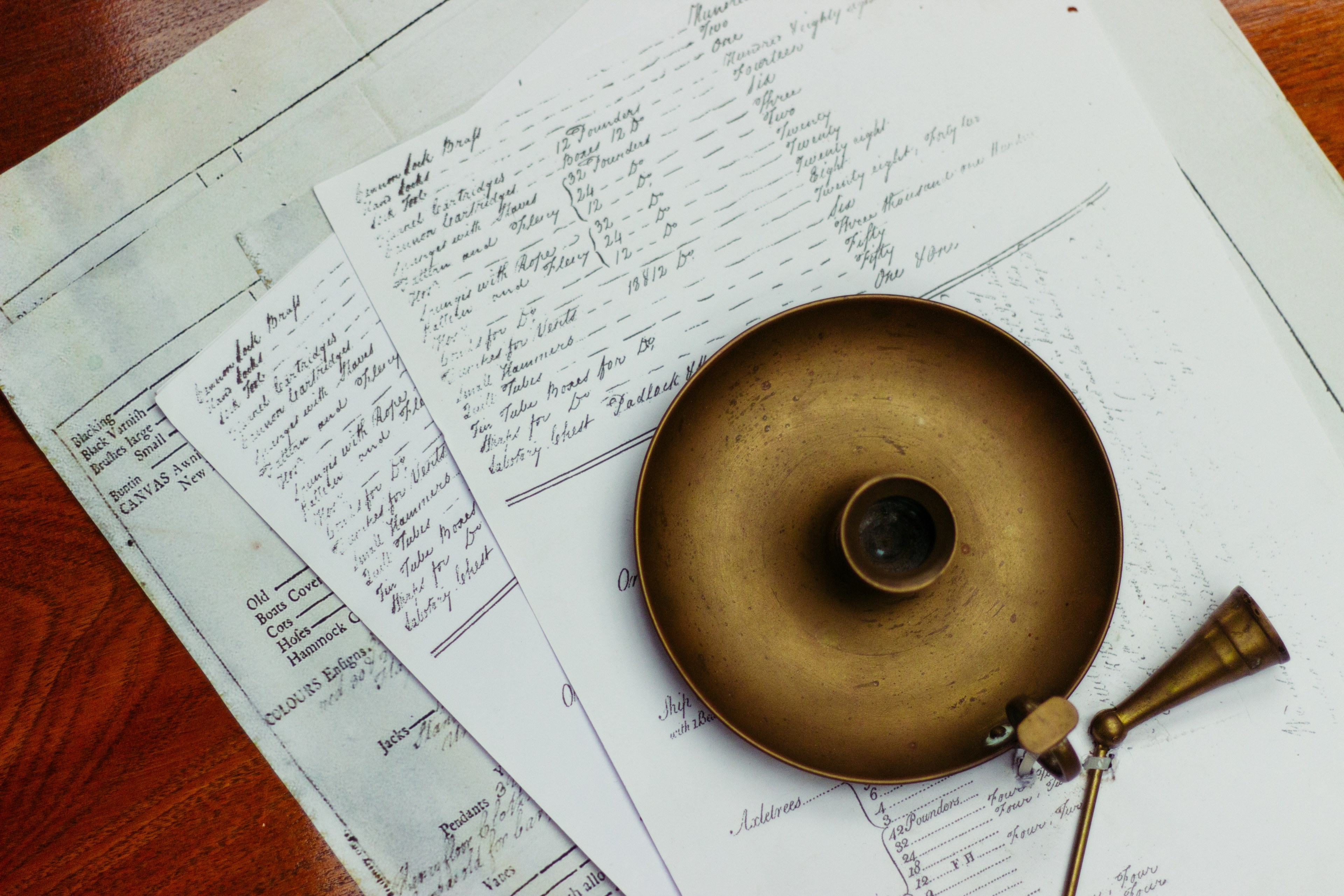 an old vintage candleholder on top of papers filled with handwritten notes in portsmouth england united kingdom, portsmouth candle 4k, HD Wallpaper