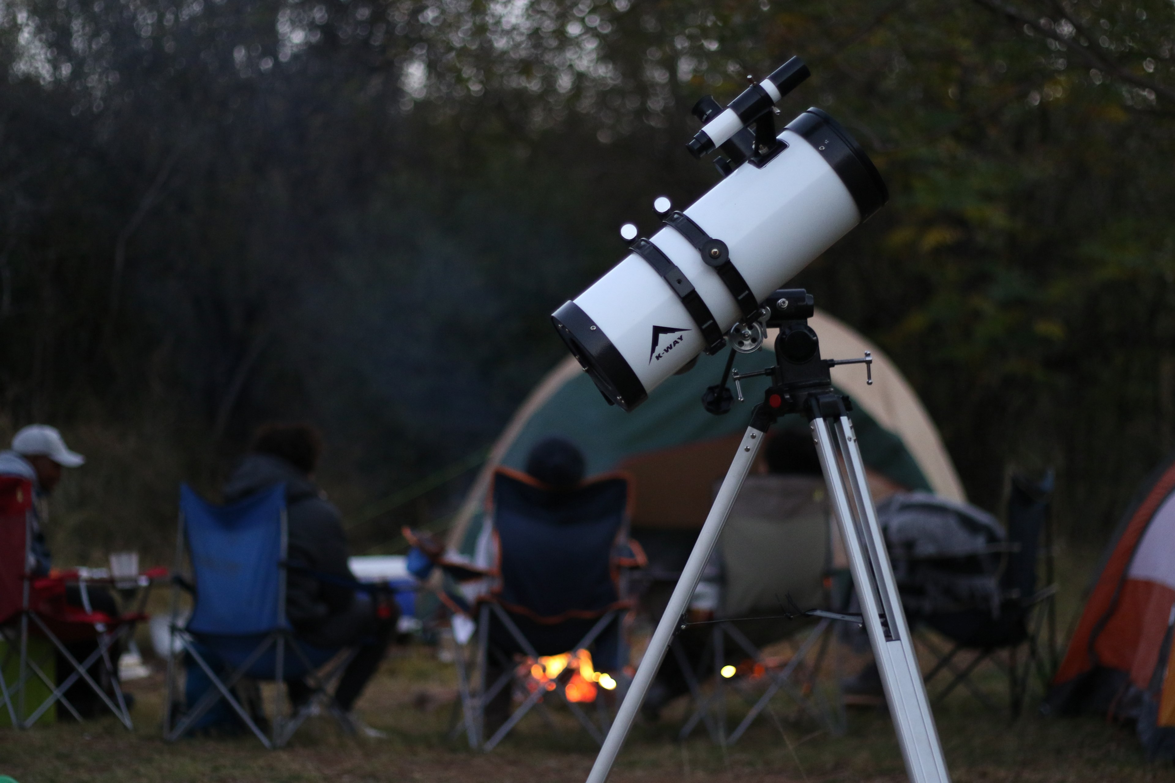 campers sitting around a campfire with their stargazing telescope set up behind them, outdoor telescope 4k, HD Wallpaper