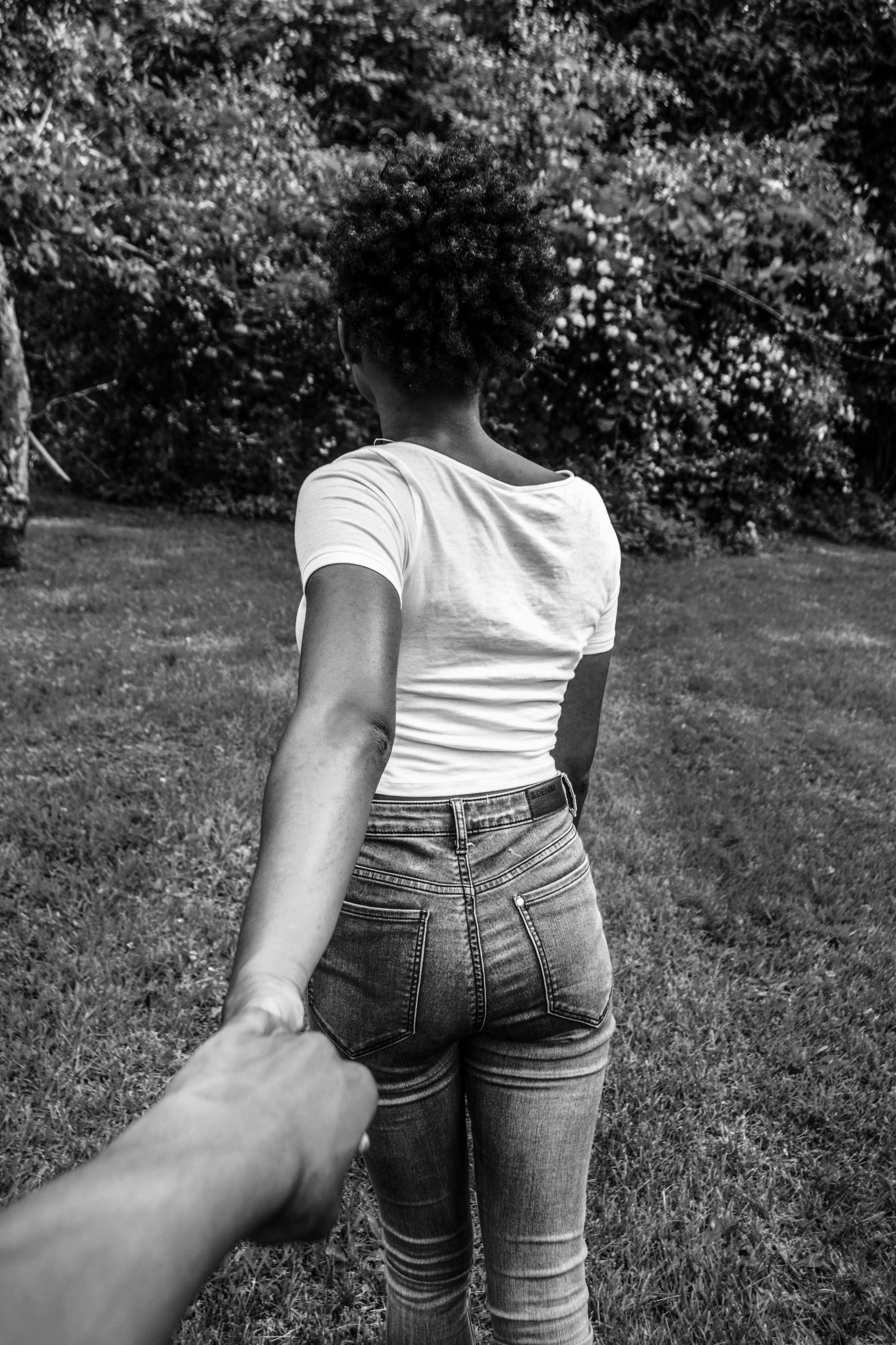 young woman walks away pulling her lover behind, with him in tow 4k, Phone HD Wallpaper