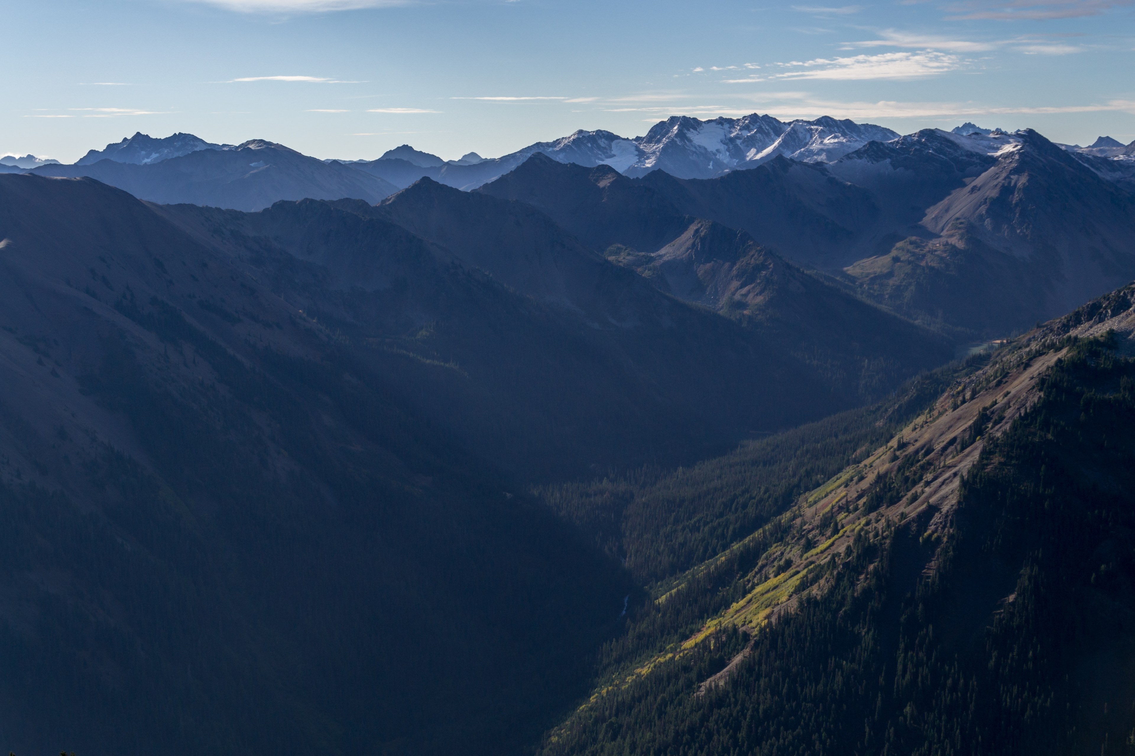 a high view of a valley cutting through the steep mountains, green mountain valley 4k, HD Wallpaper