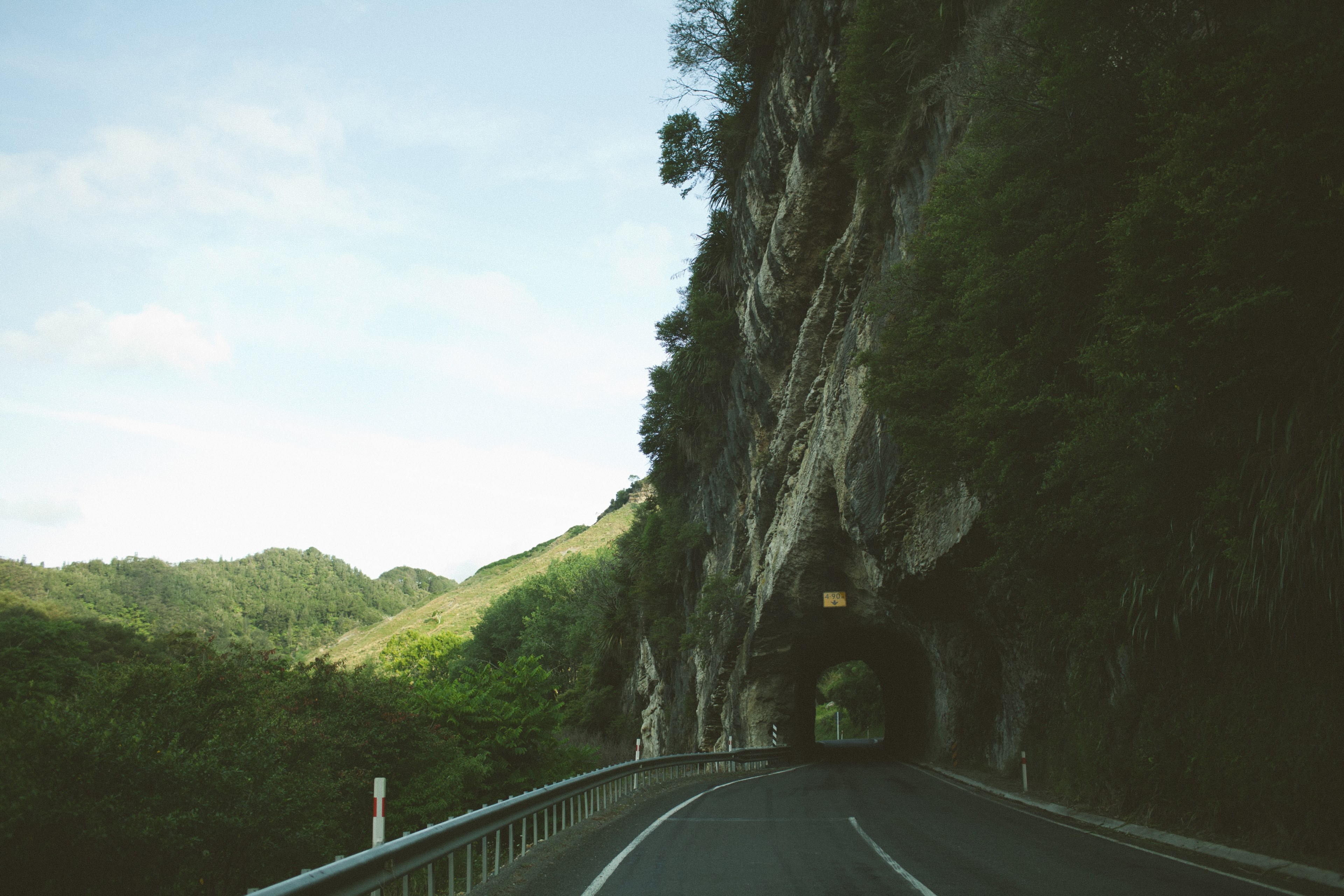 countryside road goes under a tunnel in in a mountainside, hold your breath 4k, HD Wallpaper