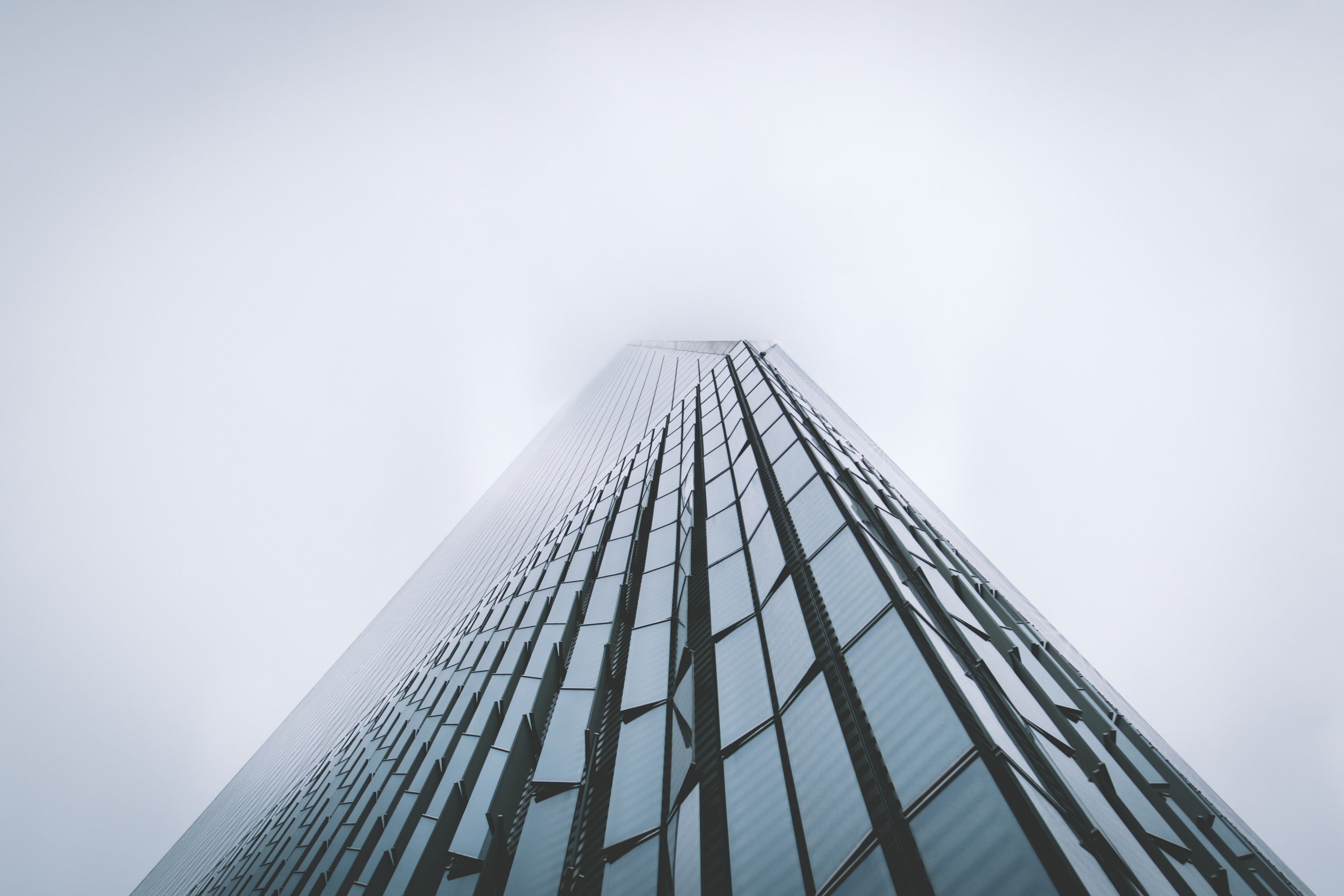 the towering facade of one world trade center building shrouded in fog, eyes up 4k, HD Wallpaper