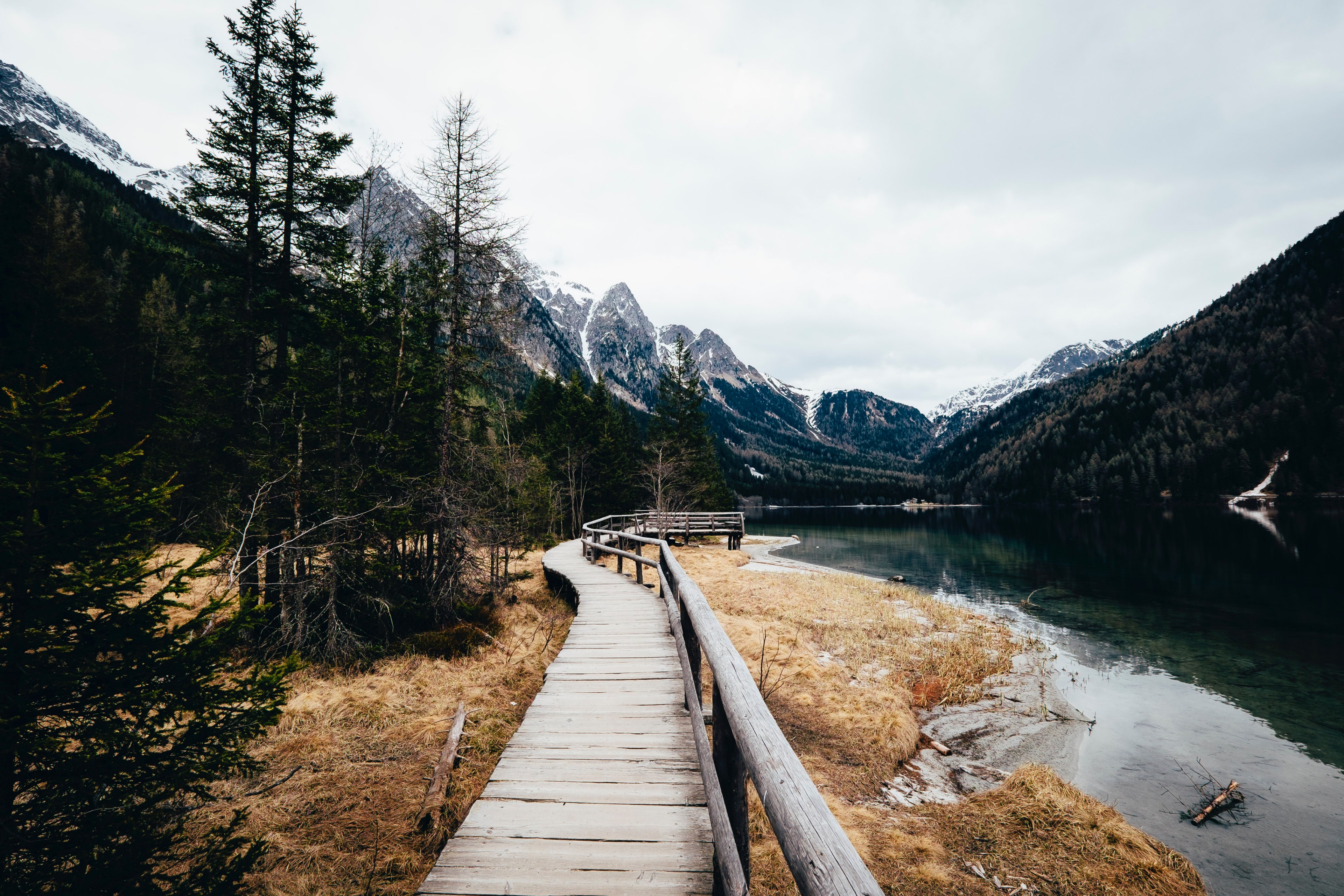 the snowcapped mountains a stream the forest and a path in antholzer see, antholzer see mountains 4k, HD Wallpaper