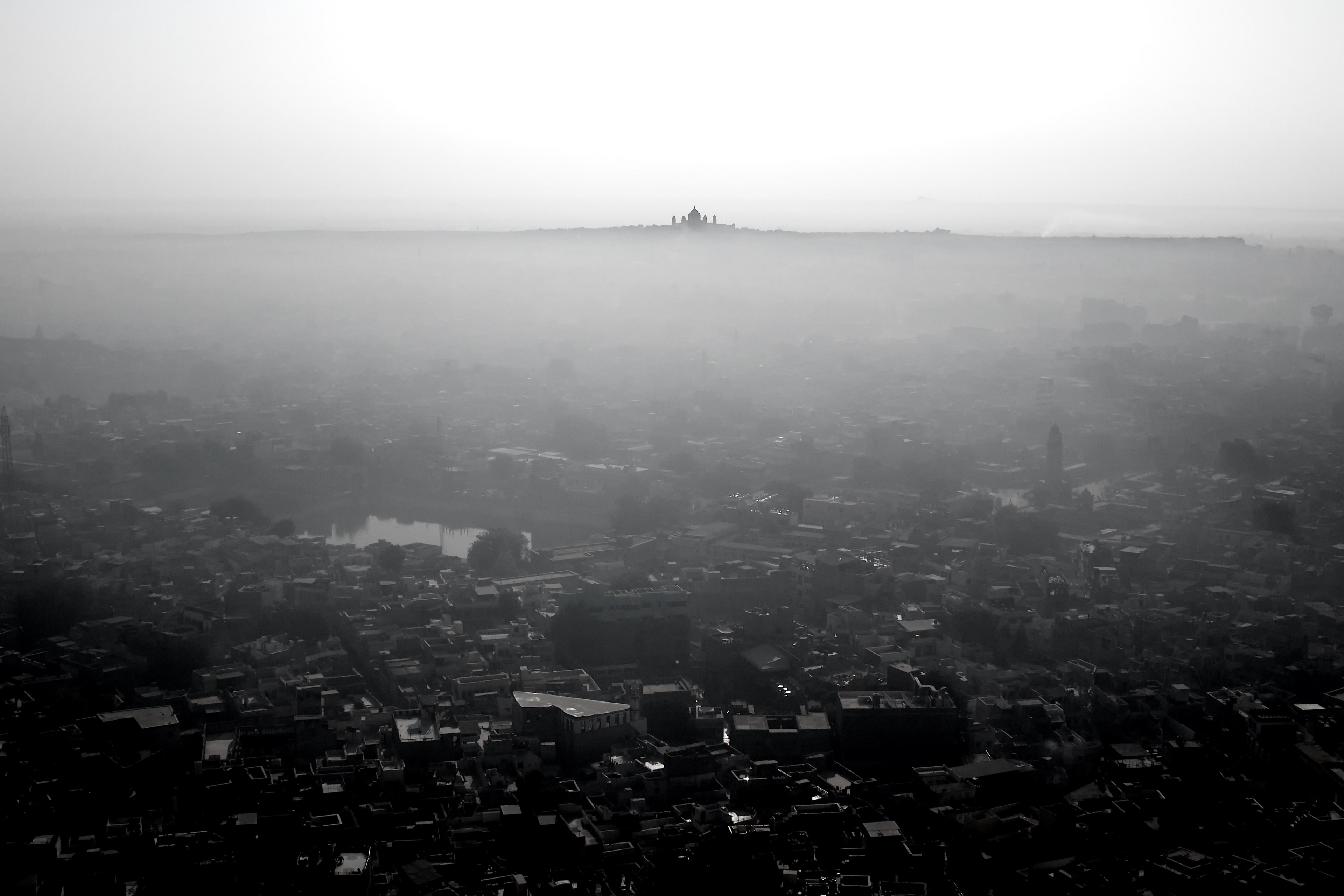 black and white shot of city with haze and taj mahal on the horizon, taj mahal on the horizon 4k, HD Wallpaper