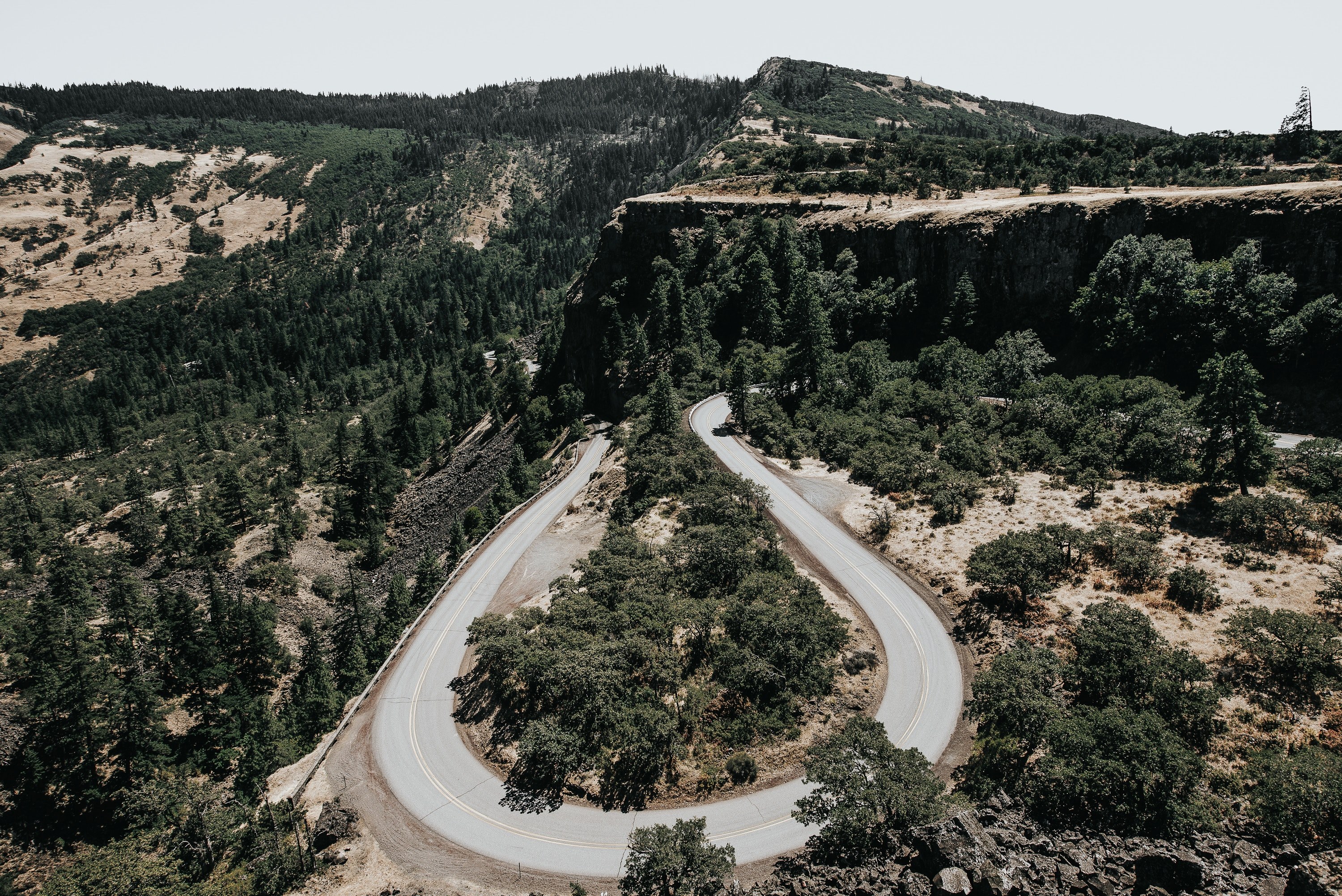a u turn in a road among wooded hills, u turn in the wilderness 4k, HD Wallpaper