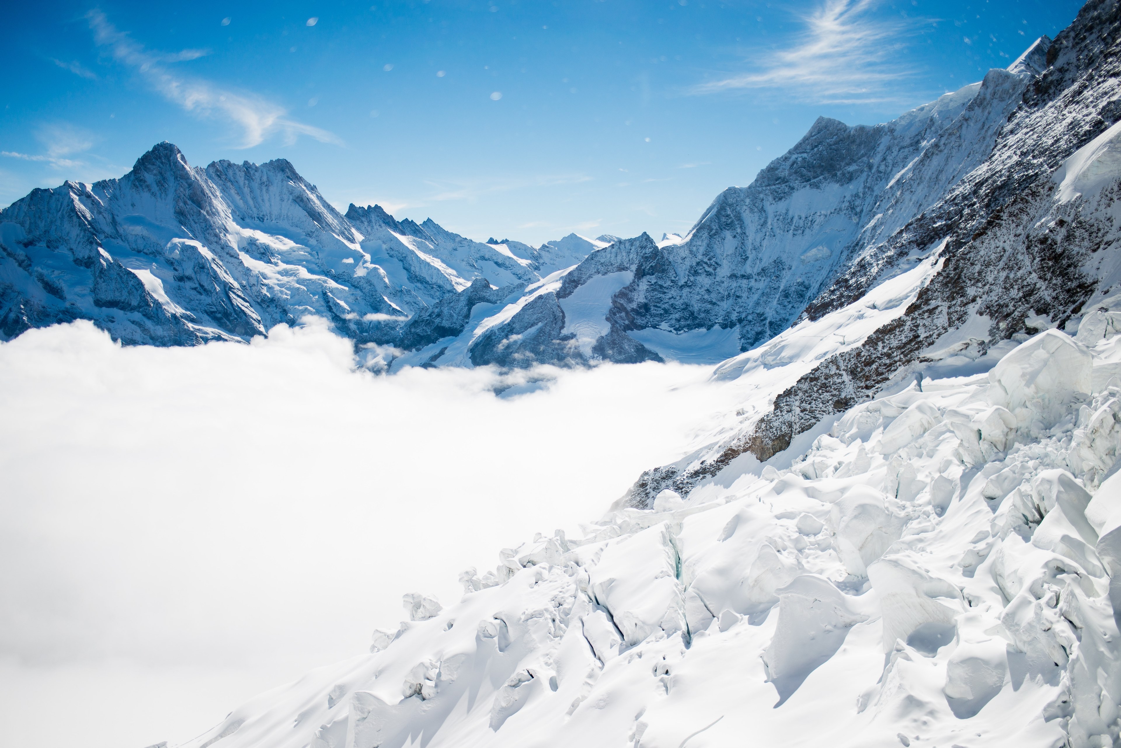 snowy plain surrounded by snow covered mountains with a bright blue sky, snowy plain bright blue sky 4k, HD Wallpaper
