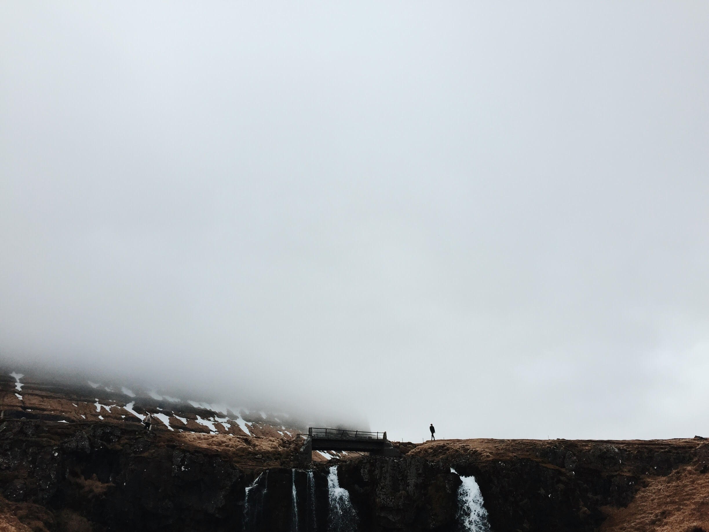 distant landscape view of kirkjufell mountain covered in fog, fog covers kirkjufell mountain 4k, HD Wallpaper