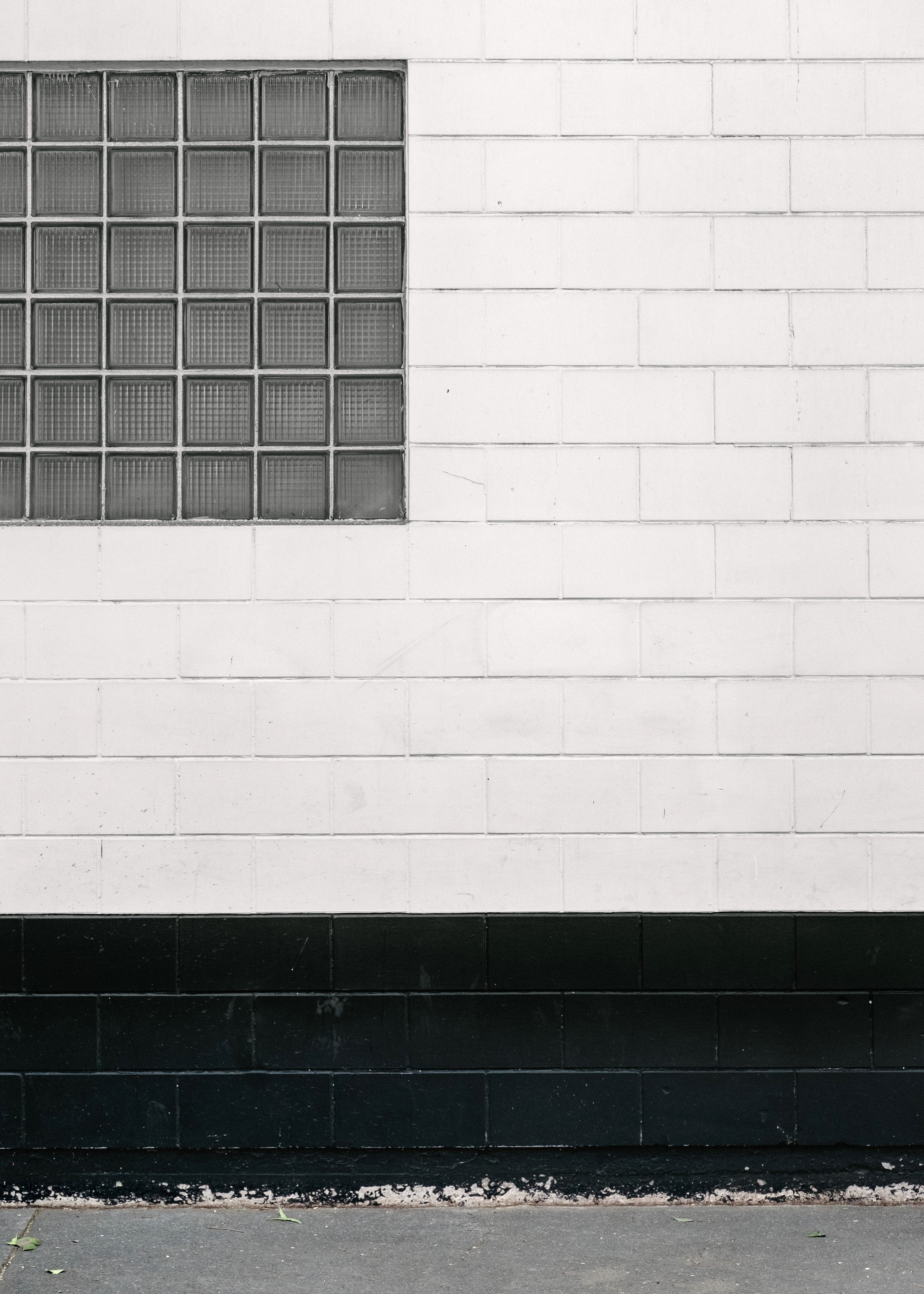 black and white shot of glass window on white wall in mexico city, window on white wall mexico 4k, Phone HD Wallpaper