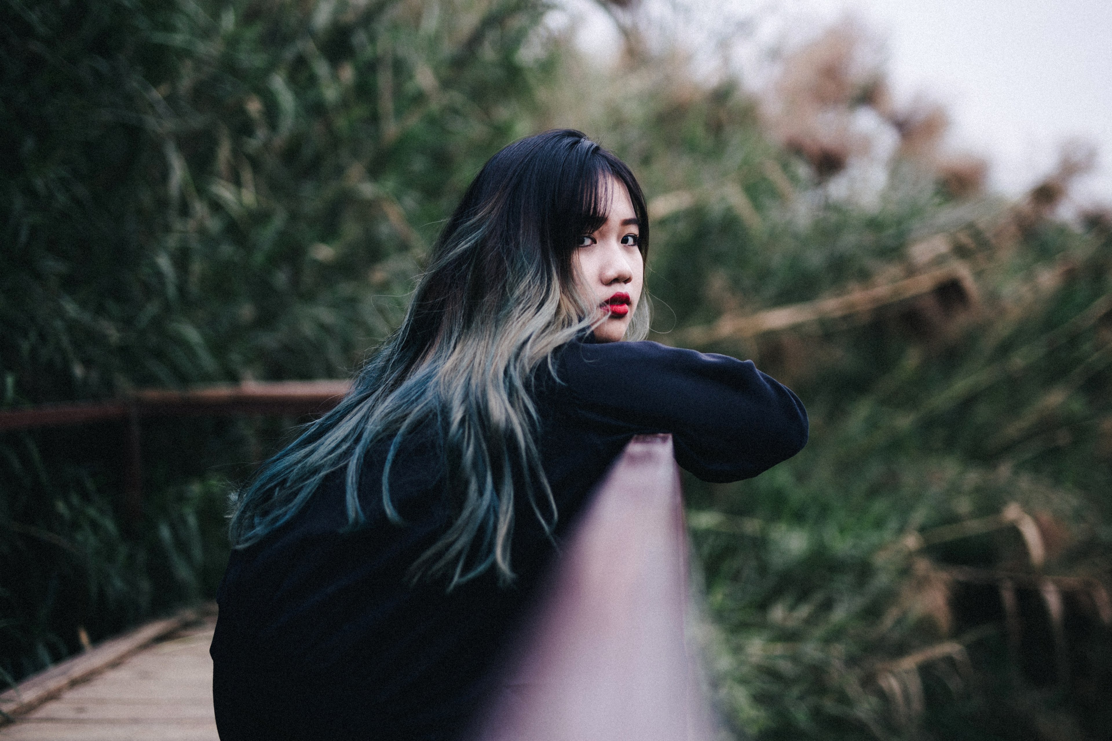 annoyed woman with colorful ombre hair standing on a bridge, annoyed and alone 4k, HD Wallpaper