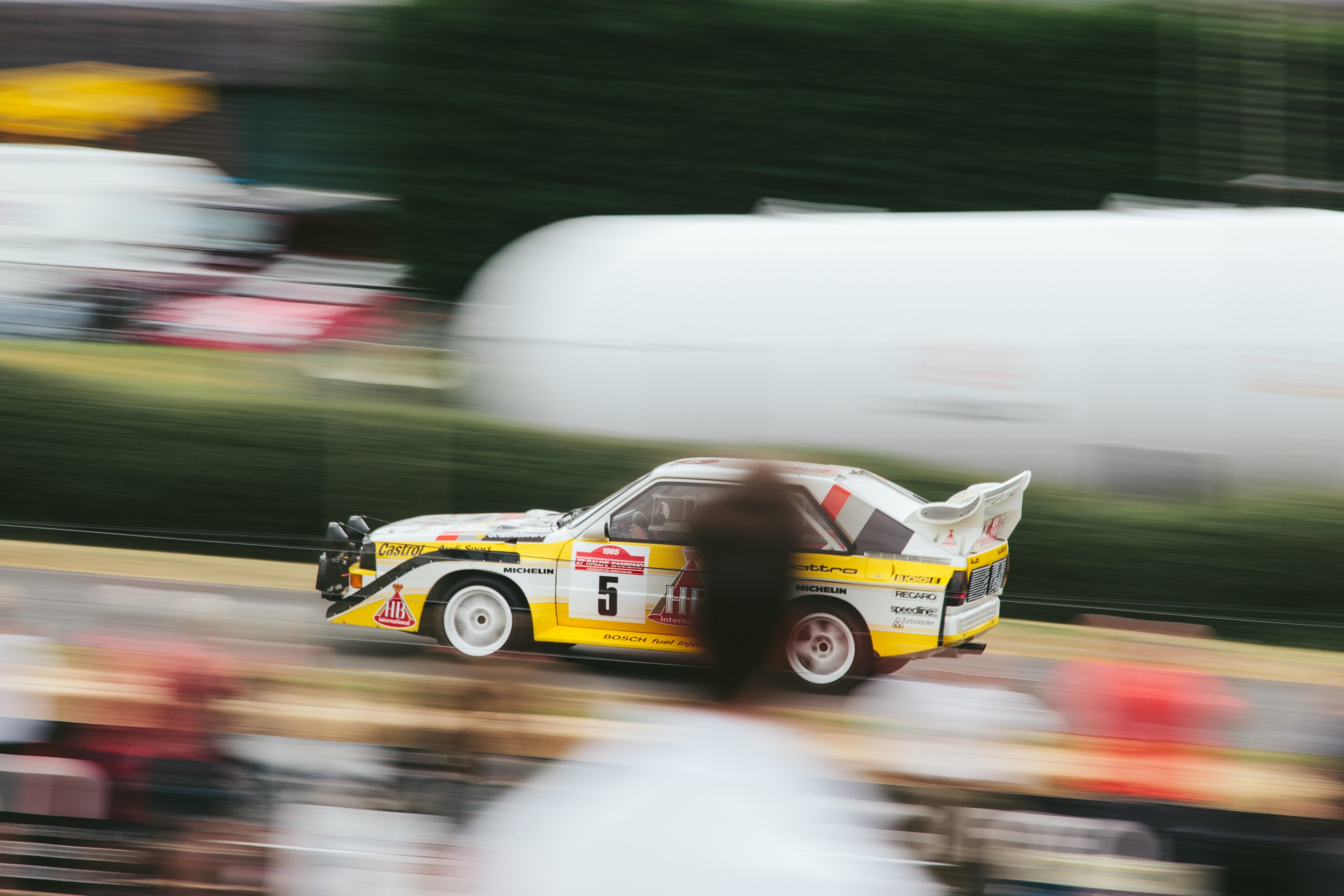 yellow and white race car speeding on track during a race near crowds, yellow white race car race 4k, HD Wallpaper