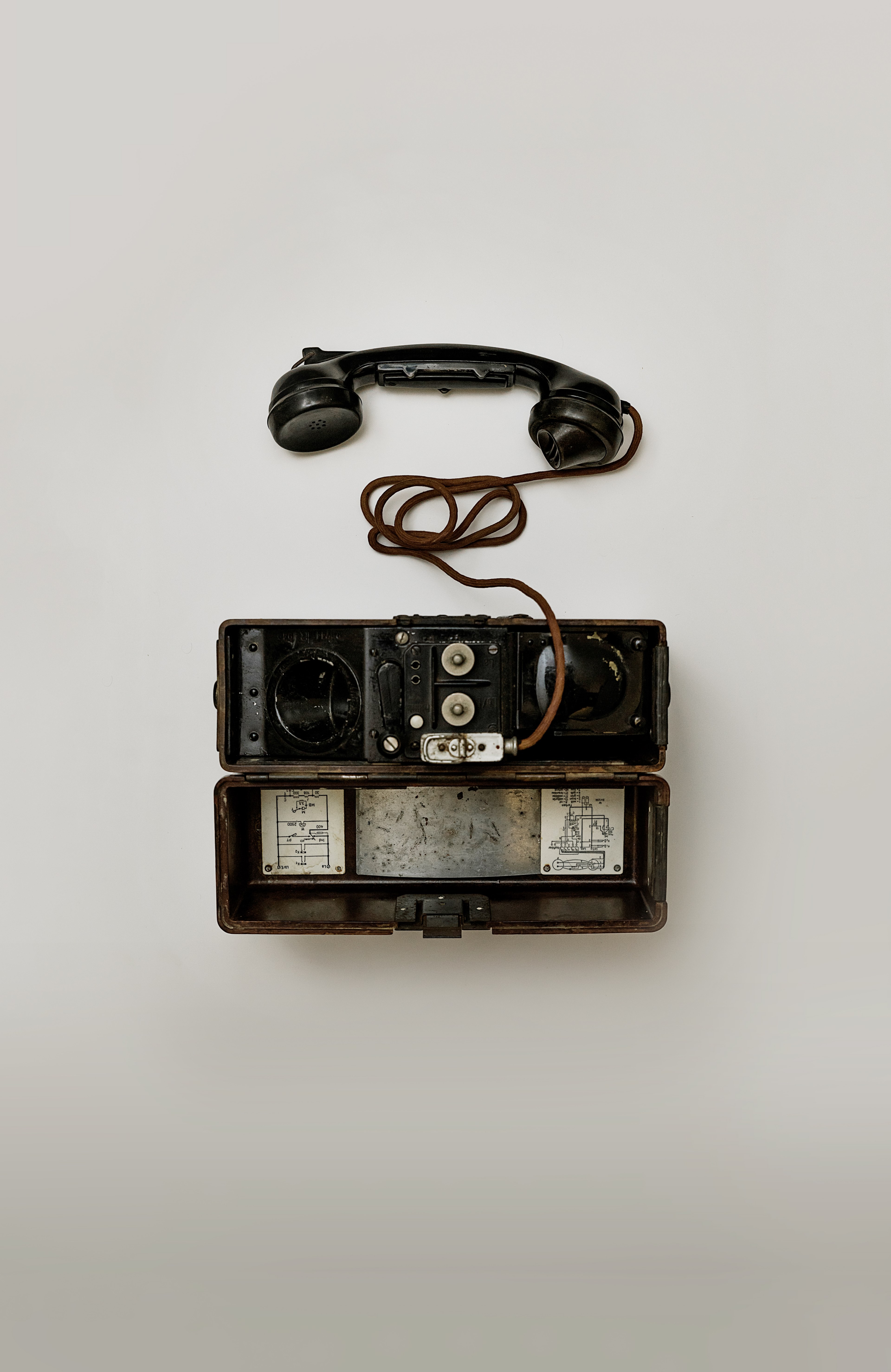 vintage telephone with a chord splayed on a white backdrop, vintage telephone 4k, Phone HD Wallpaper