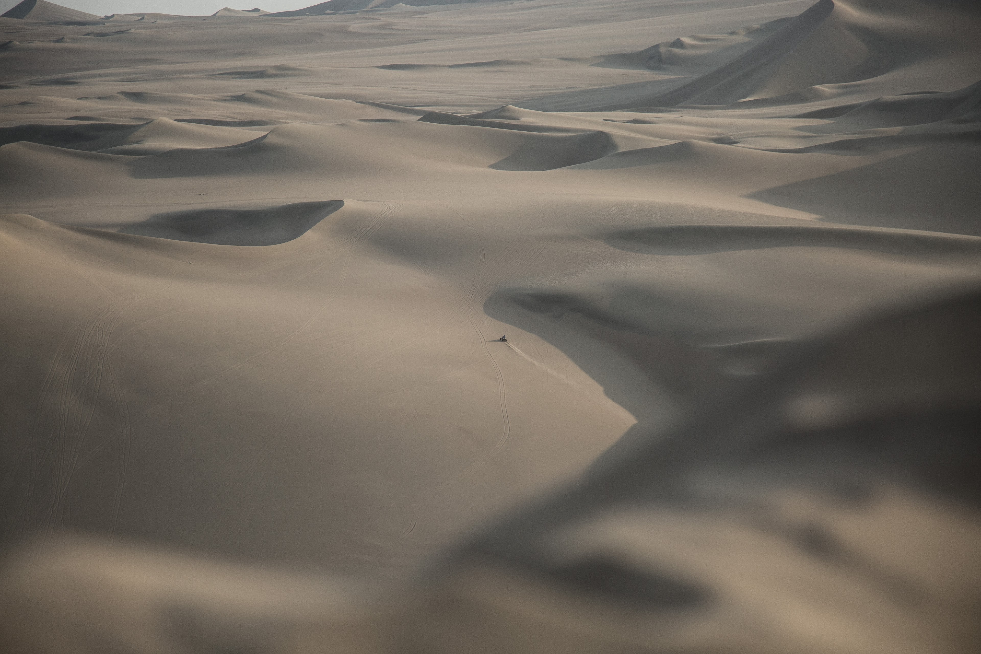 atv biking through the rolling sand dunes of huacachina desert, near and far 4k, HD Wallpaper