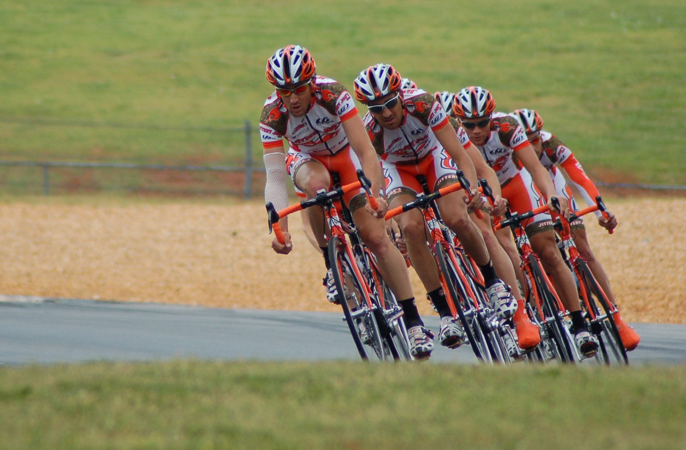 a team of four cyclists driving at the road atlanta bike course, road atlanta cyclists 4k, HD Wallpaper